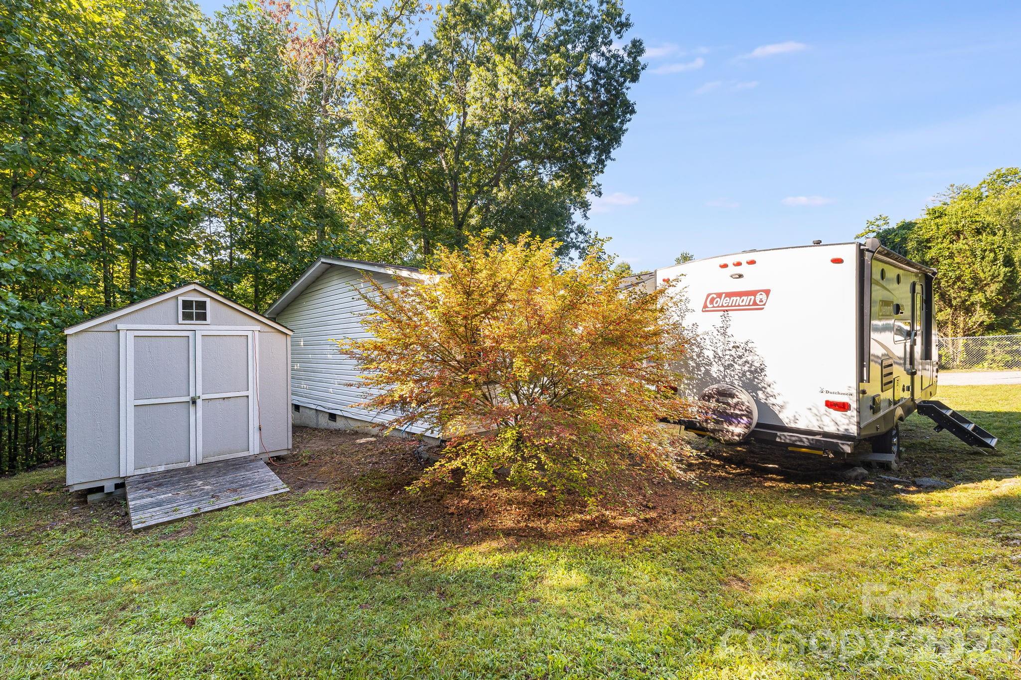 Left side of house and shed - 96 Fallswood Court, Hendersonville