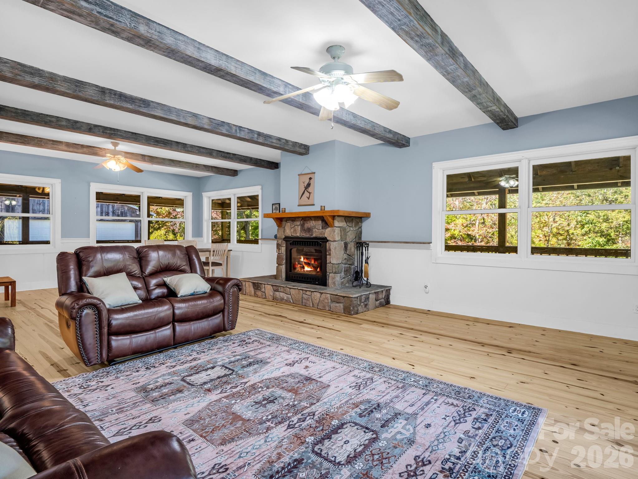 Great room with stone fireplace centerpiece for living & dining rooms - 119 Mountain Bluff Trail, Hendersonville