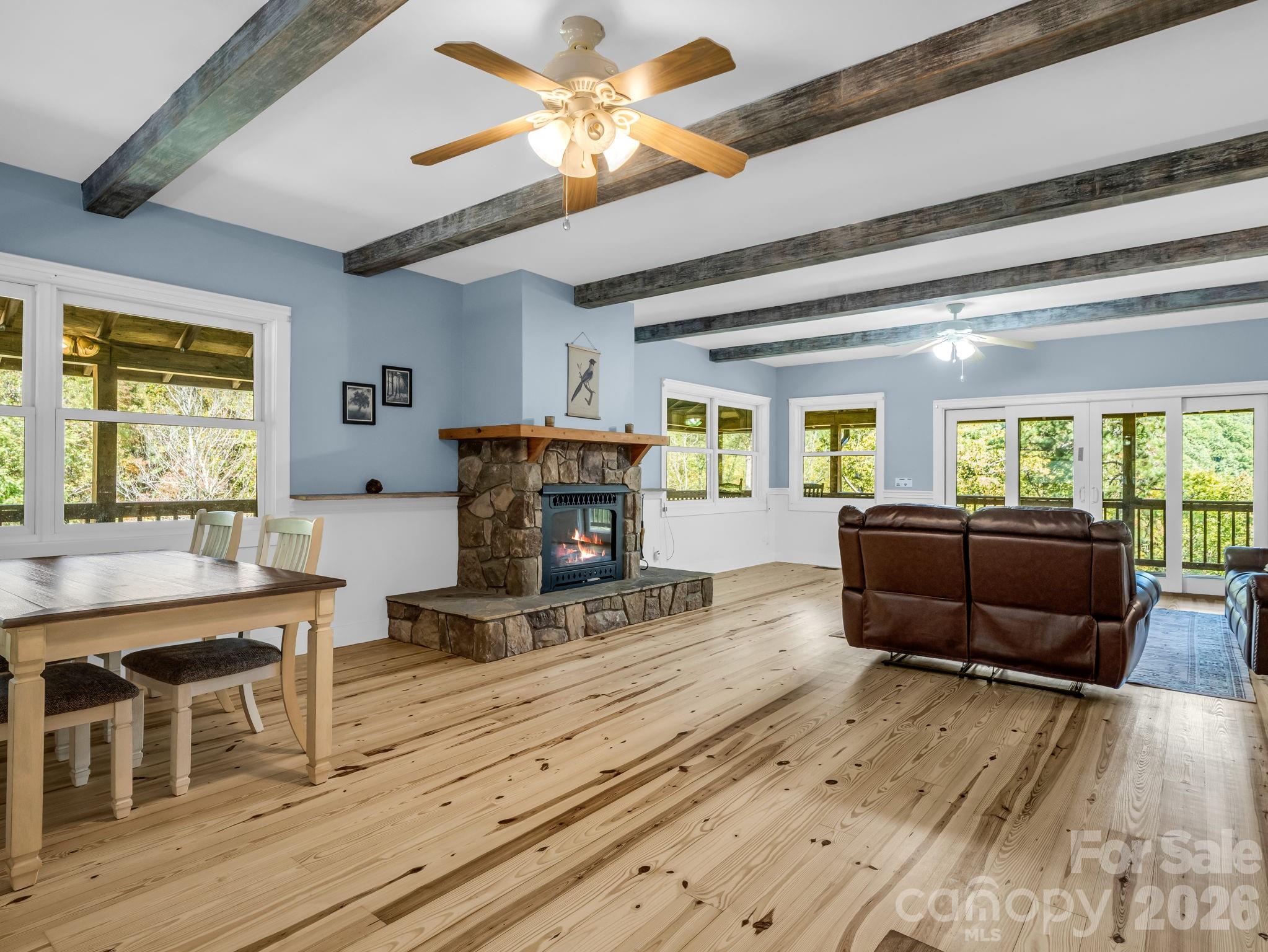 Great room with stone fireplace centerpiece for living & dining rooms - 119 Mountain Bluff Trail, Hendersonville