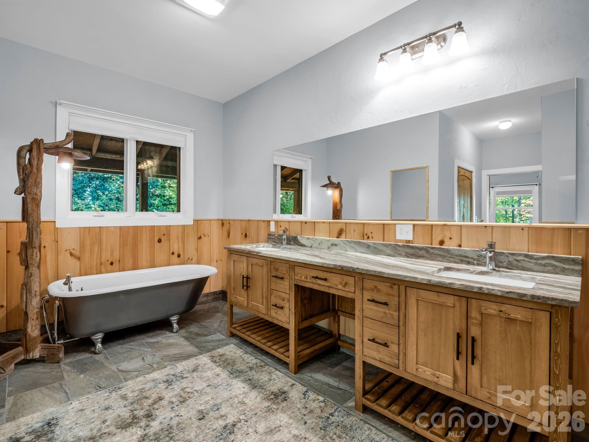 Primary en suite bath with clawfoot soaking tub & double vanity - 119 Mountain Bluff Trail, Hendersonville