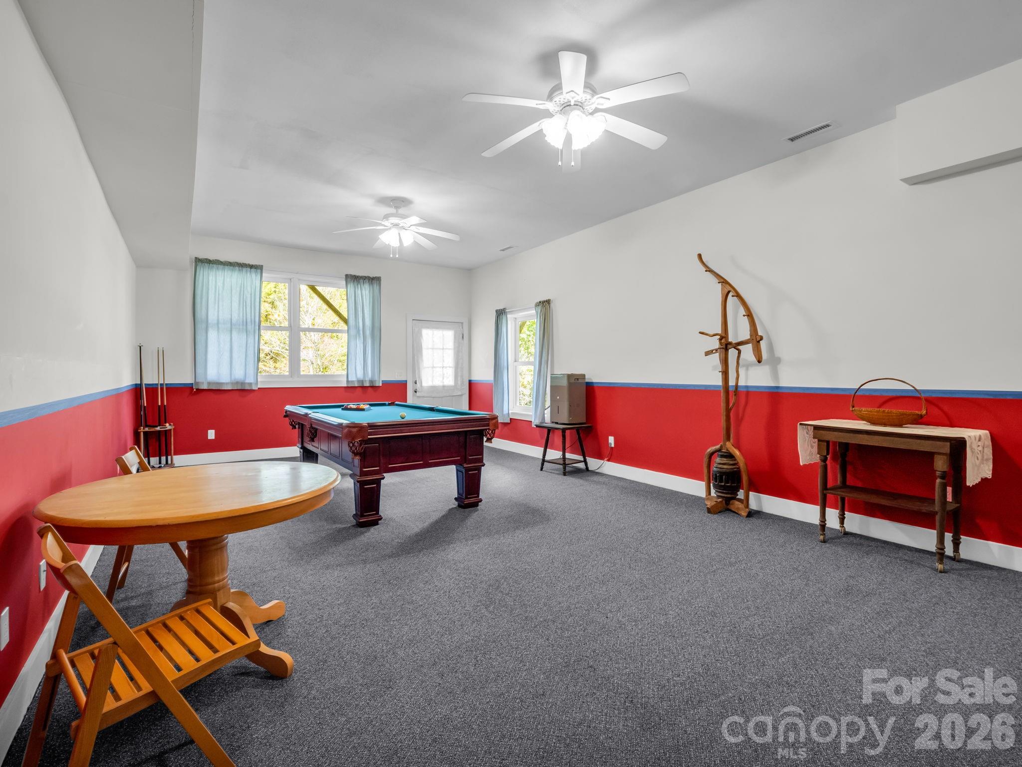 Lower level billiard room for with natural light, walks out to raised bed gardens - 119 Mountain Bluff Trail, Hendersonville