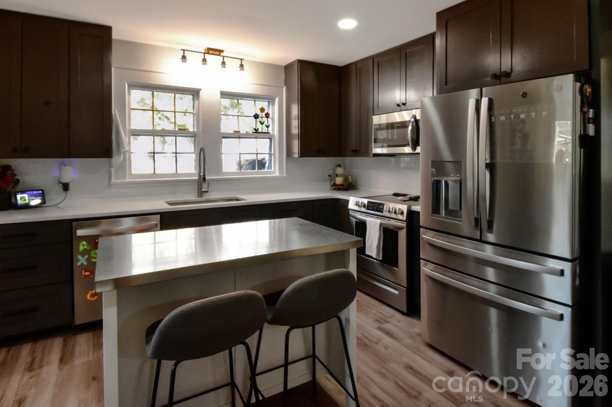 Kitchen with stainless appliances - 541 Perry Road, Troutman
