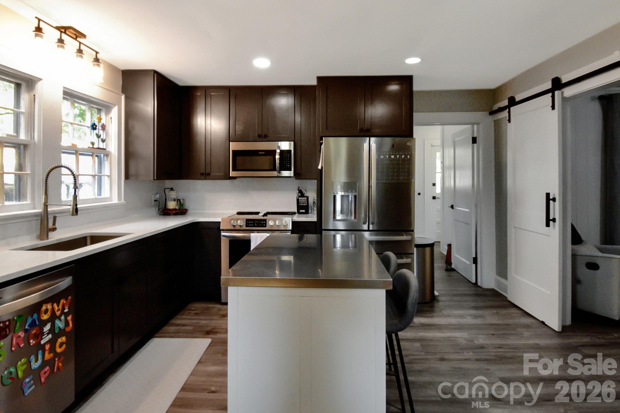 Kitchen with stainless appliances - 541 Perry Road, Troutman