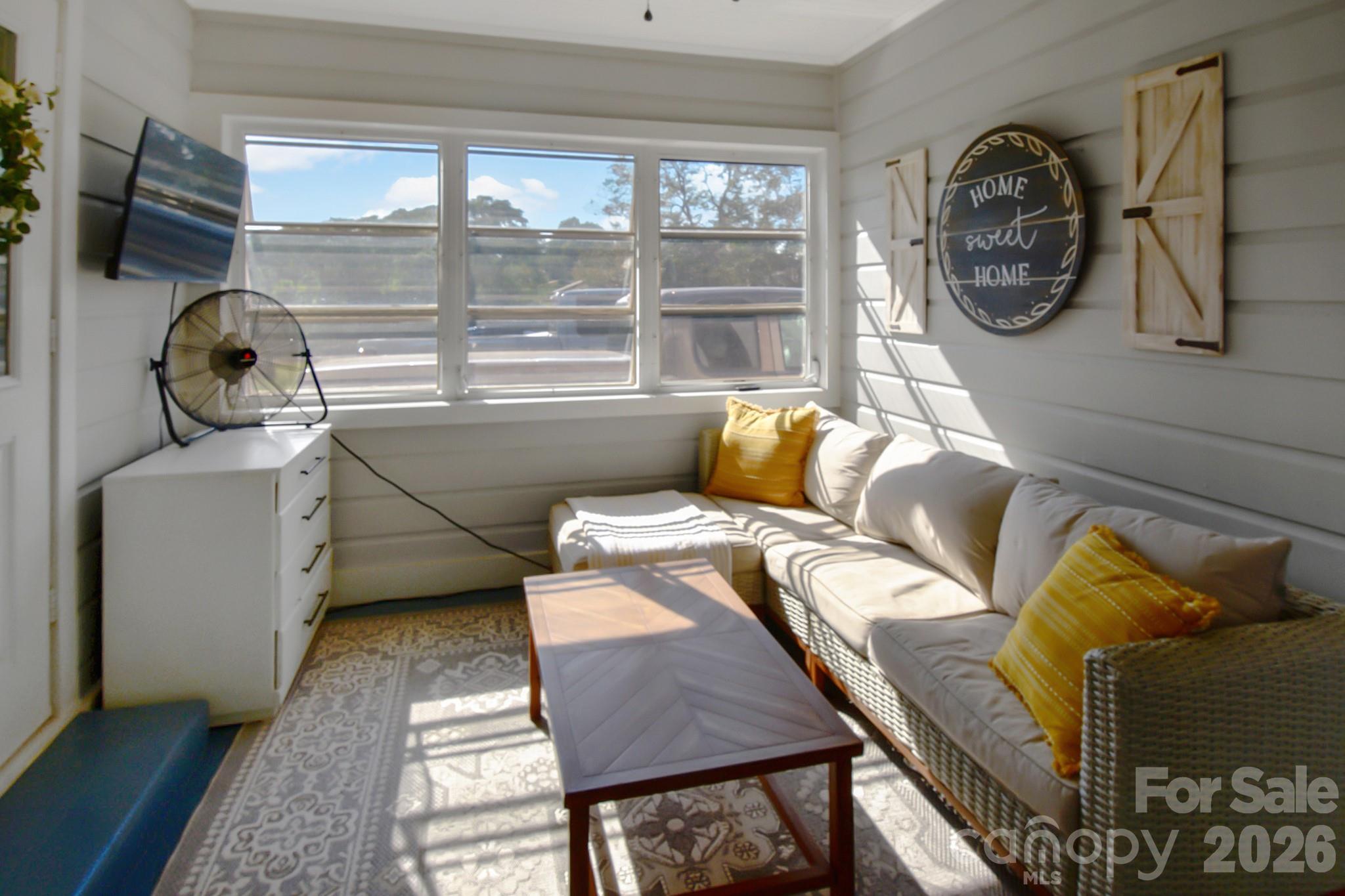 Sunroom between garage and kitchen/dining area - 541 Perry Road, Troutman