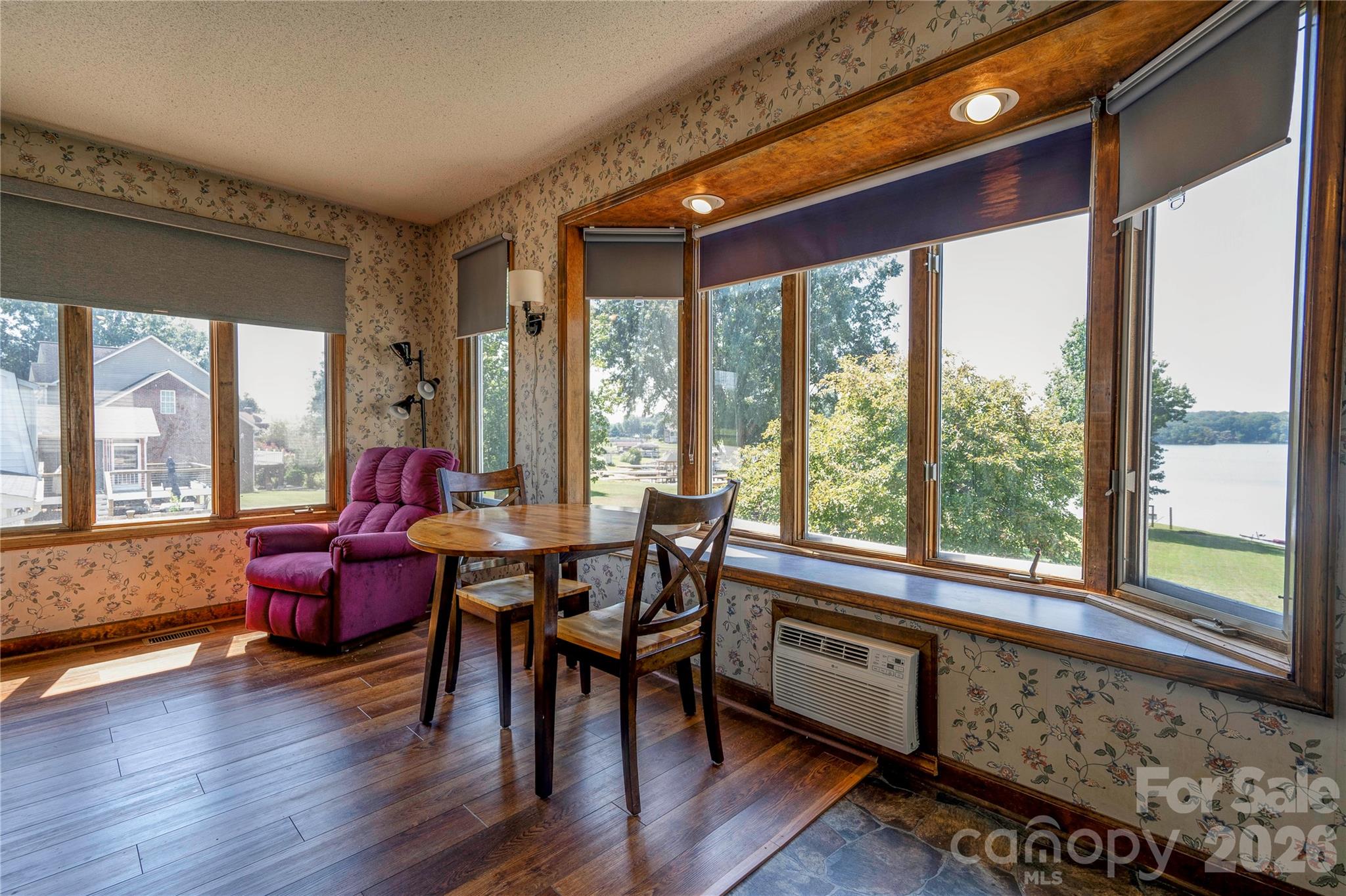 Sunroom off the primary bedroom used to have a hot tub but it has been removed. - 152 North Shore Drive, Cherryville