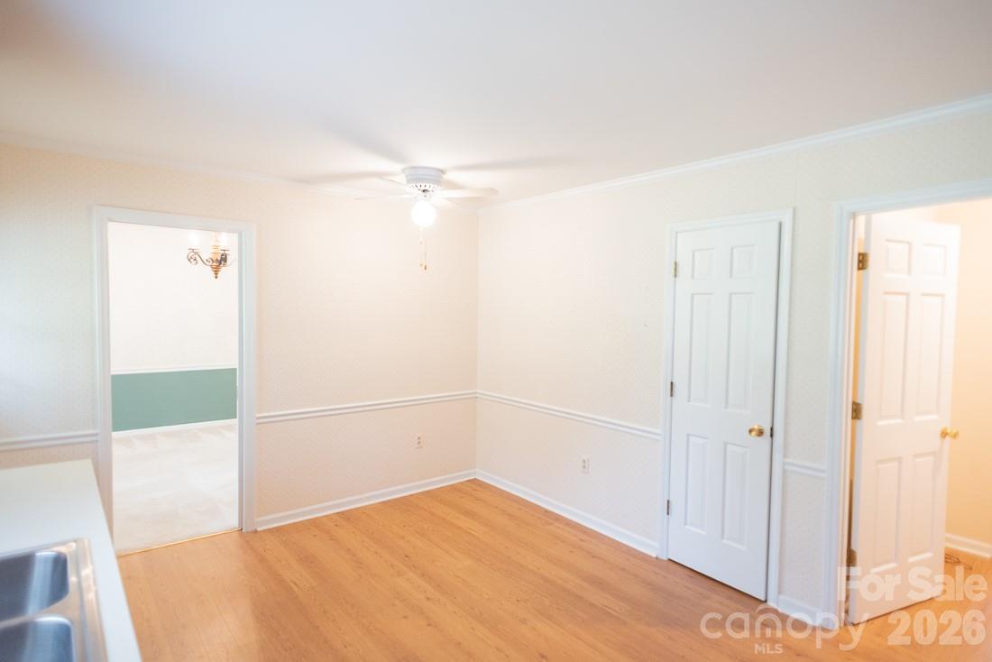 Breakfast area of Kitchen with pantry door - 3401 Tracelake Drive, Matthews