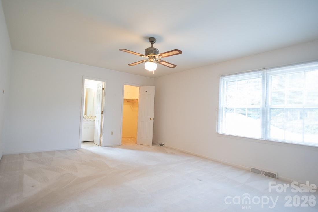 Primary Bedroom with ensuite and walk-in closet! - 3401 Tracelake Drive, Matthews