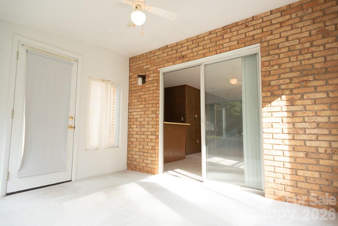 Sunroom off the Family Room with exterior door - 3401 Tracelake Drive, Matthews