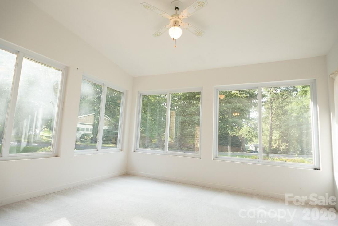 Sunroom with so many windows to look out - 3401 Tracelake Drive, Matthews