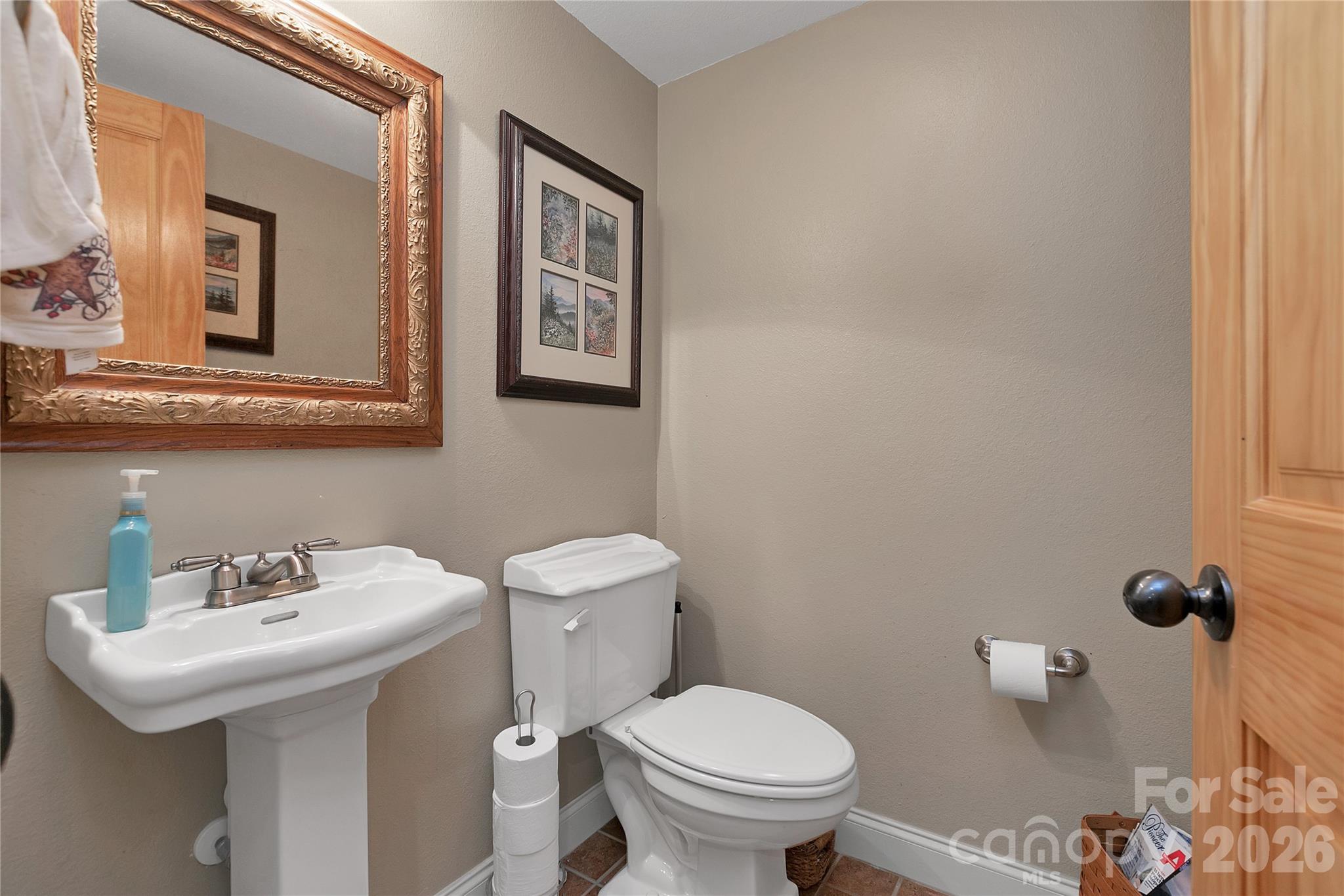 Half bath between Entryway and Great Room - 111 Kanunu Court, Brevard