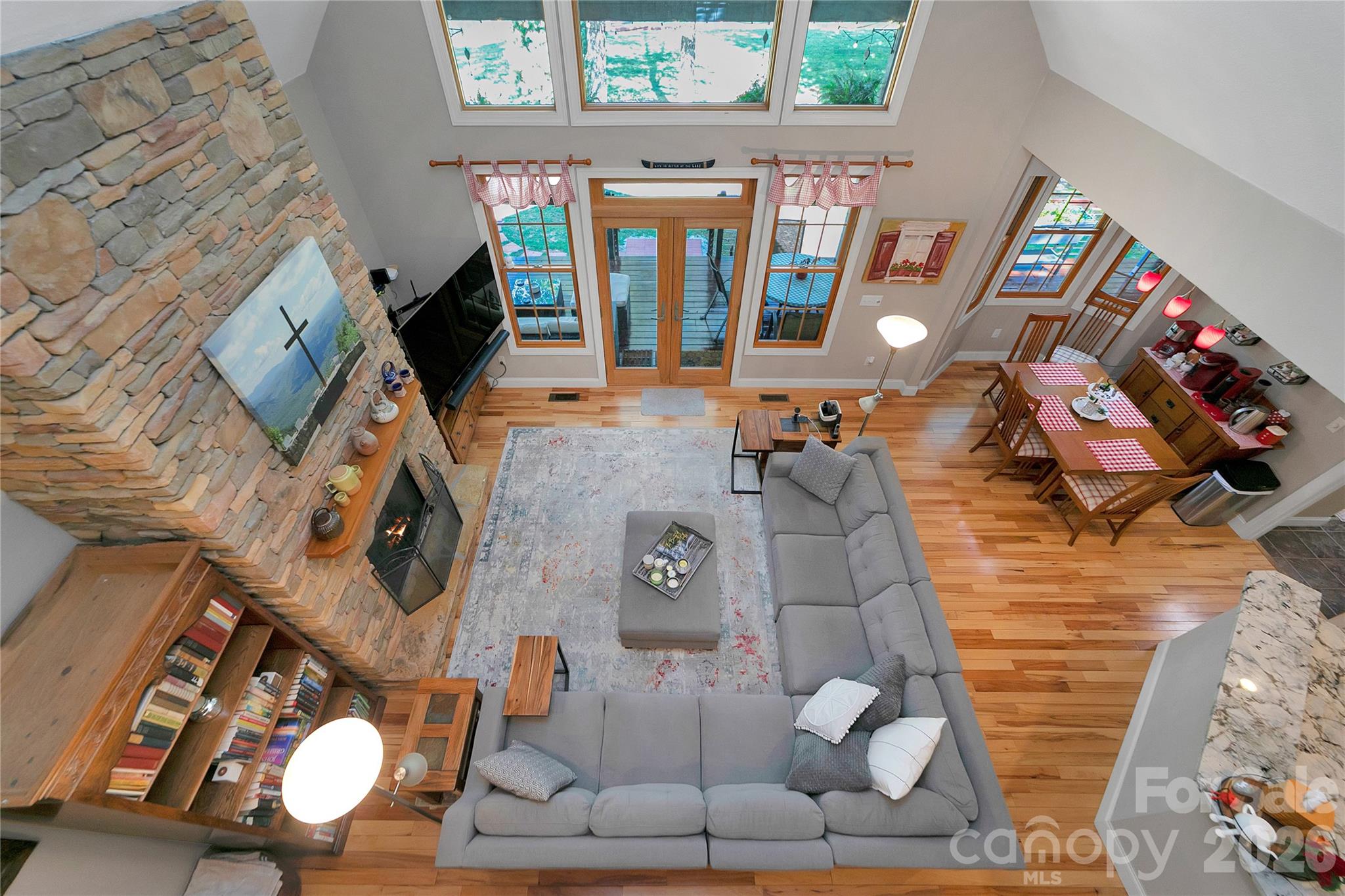 View of Open Concept Living space from the Loft. - 111 Kanunu Court, Brevard