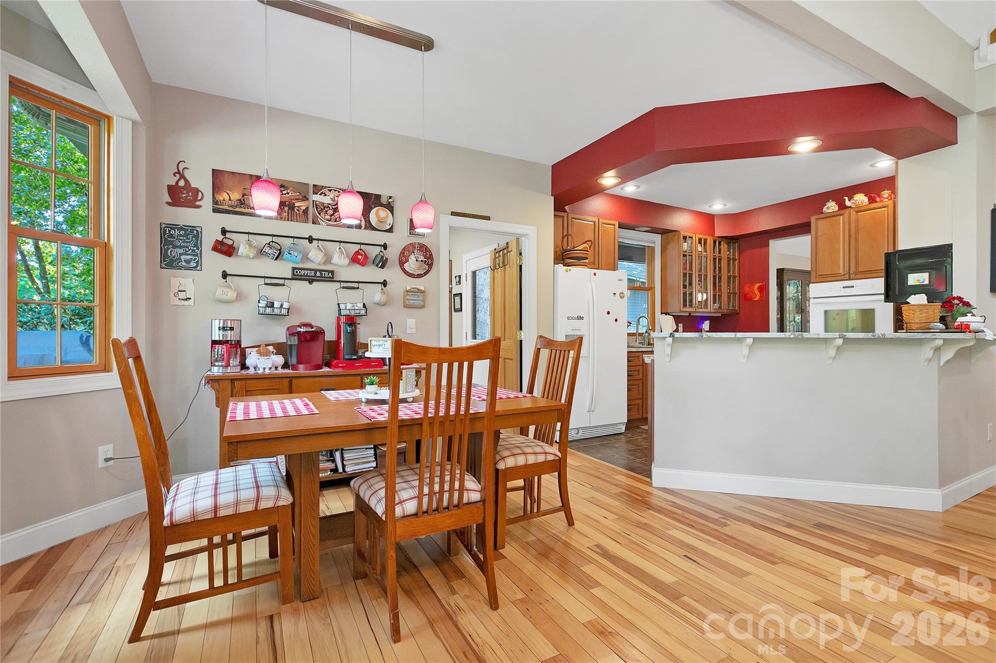 Breakfast area is off the open concept Kitchen - 111 Kanunu Court, Brevard