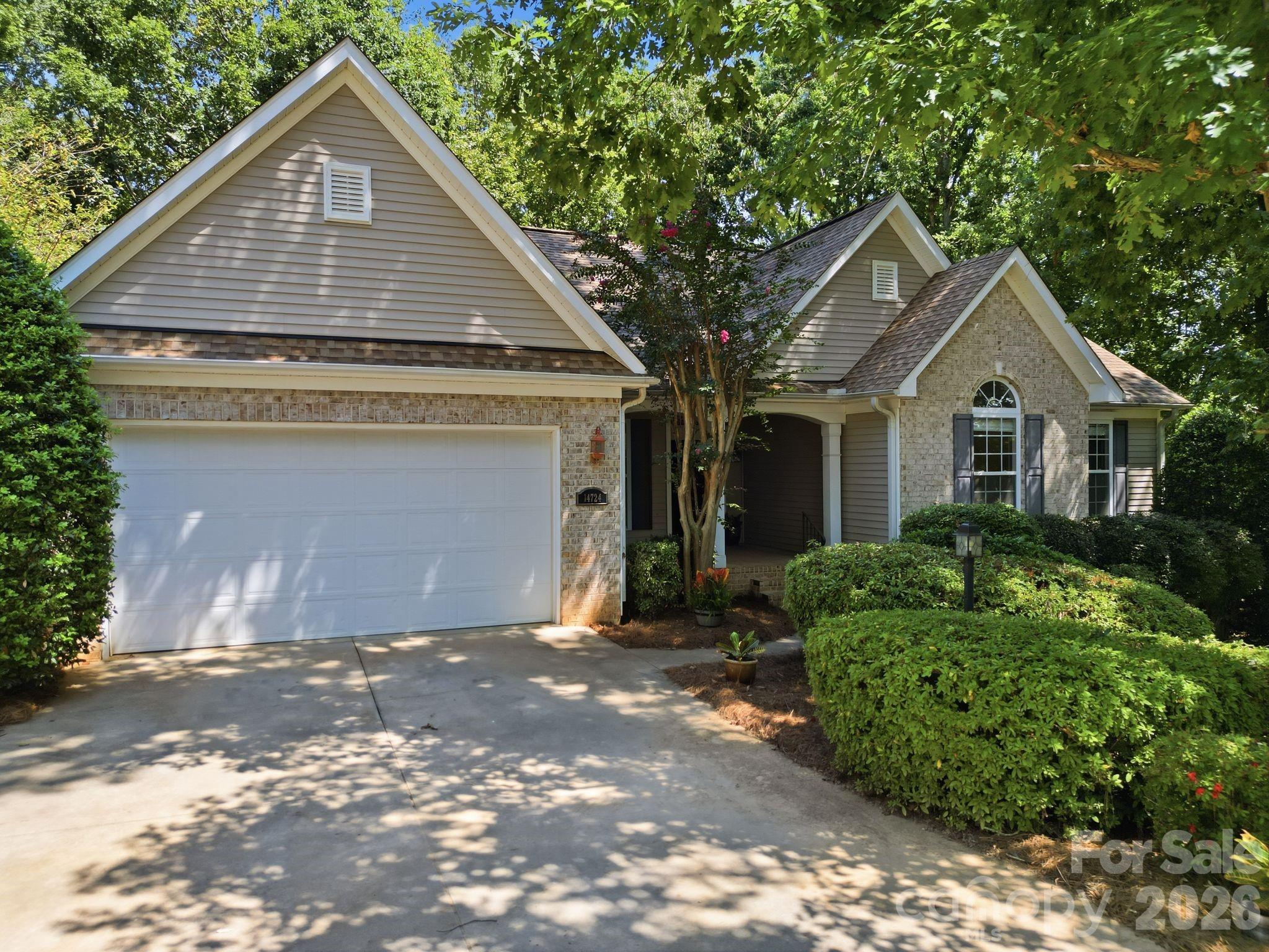 Front of Home with extensive landscaping - 14724 Beatties Ford Road, Huntersville