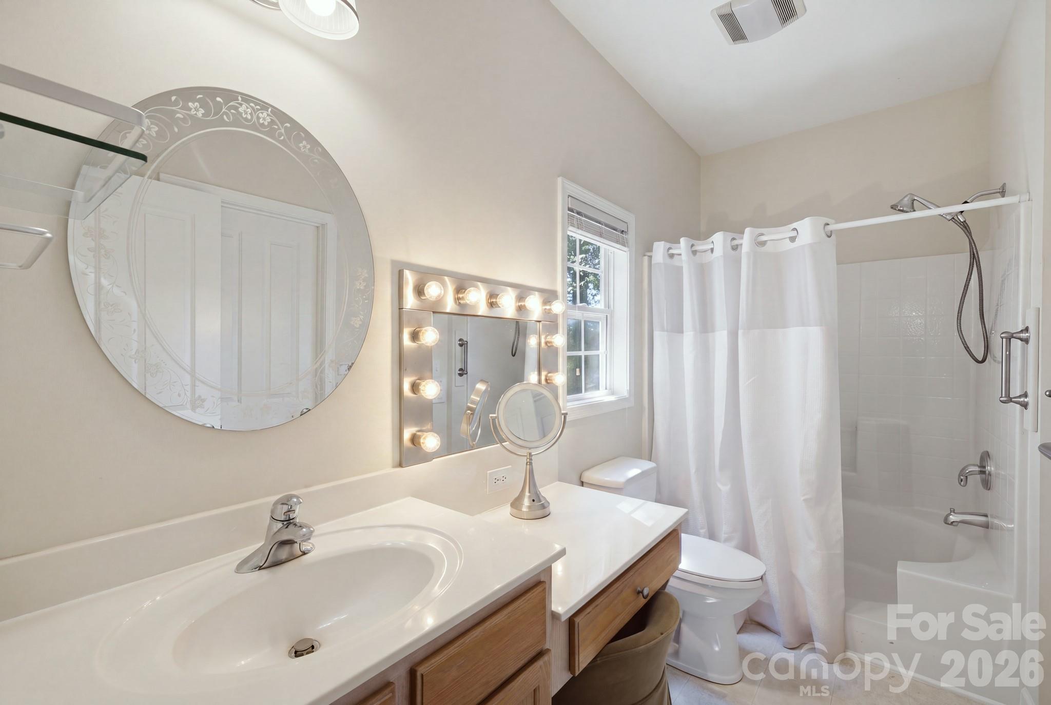 Primary bathroom with vanity - 14724 Beatties Ford Road, Huntersville