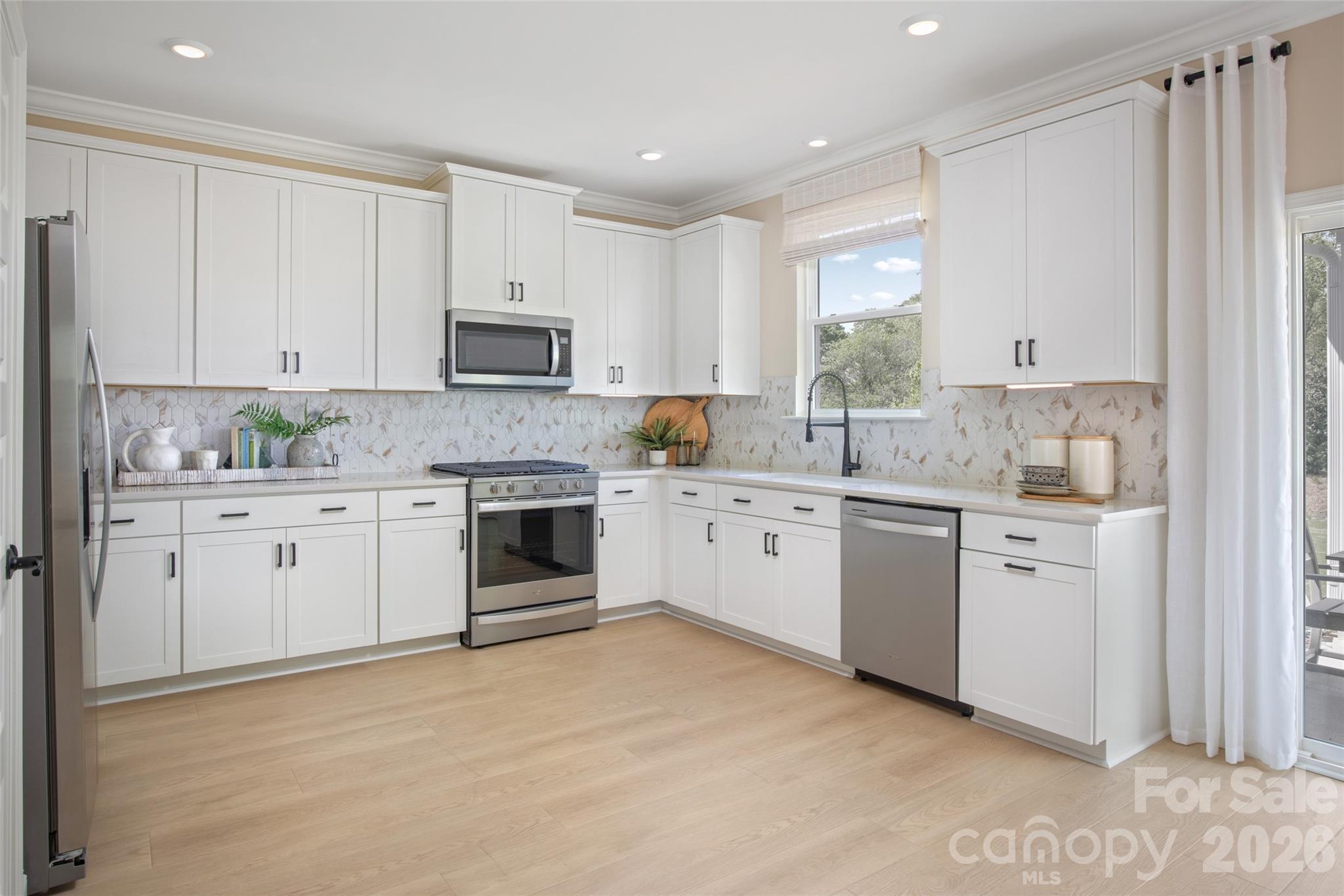 Representation Photo from Model Home of plan - options/selections may vary on home available. Please confirm all selections with onsite Sales Counselor. - 1819 Quiet Woods Road, Monroe