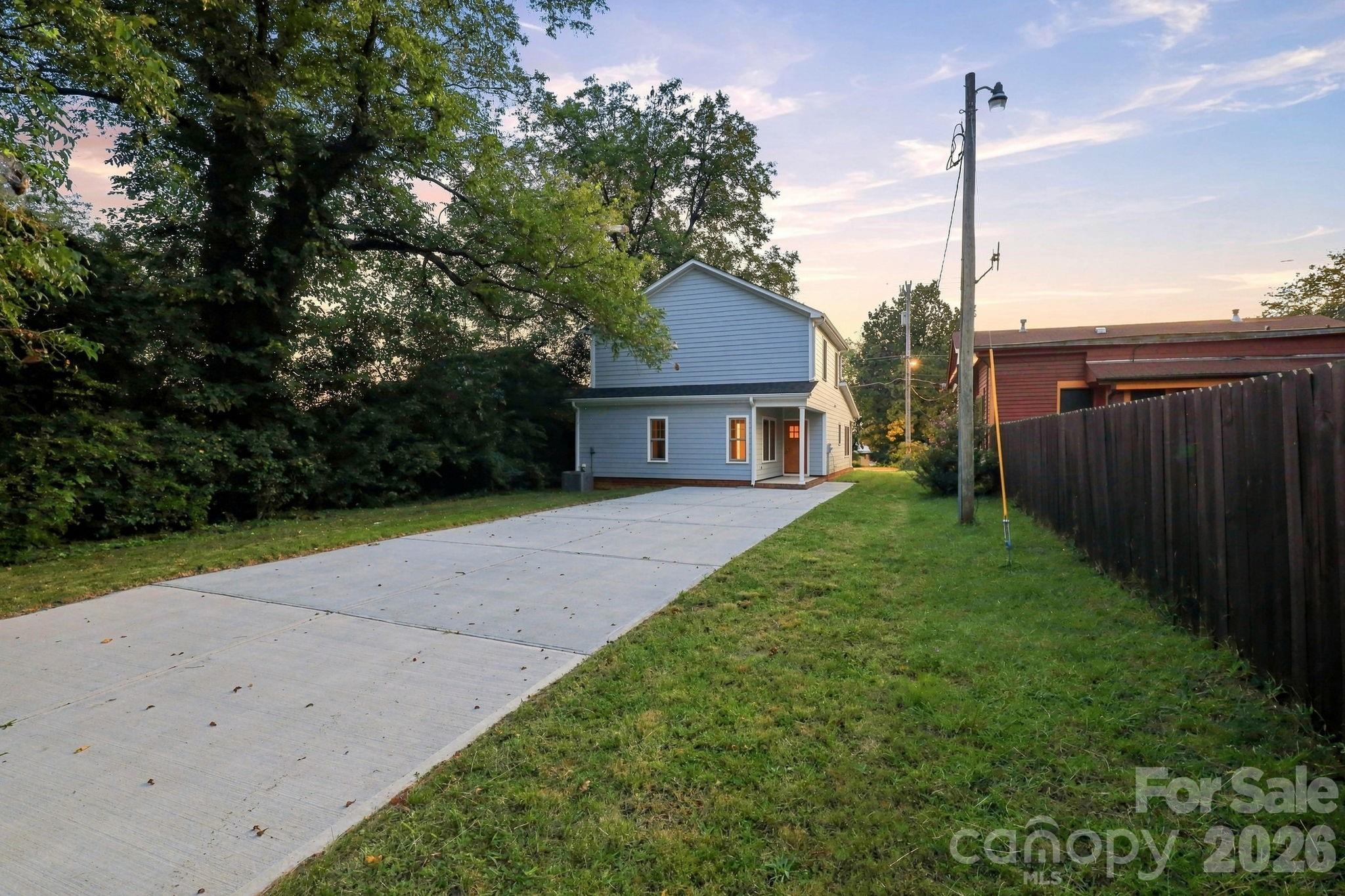 Rear of house and driveway - 629 S Race Street, Statesville