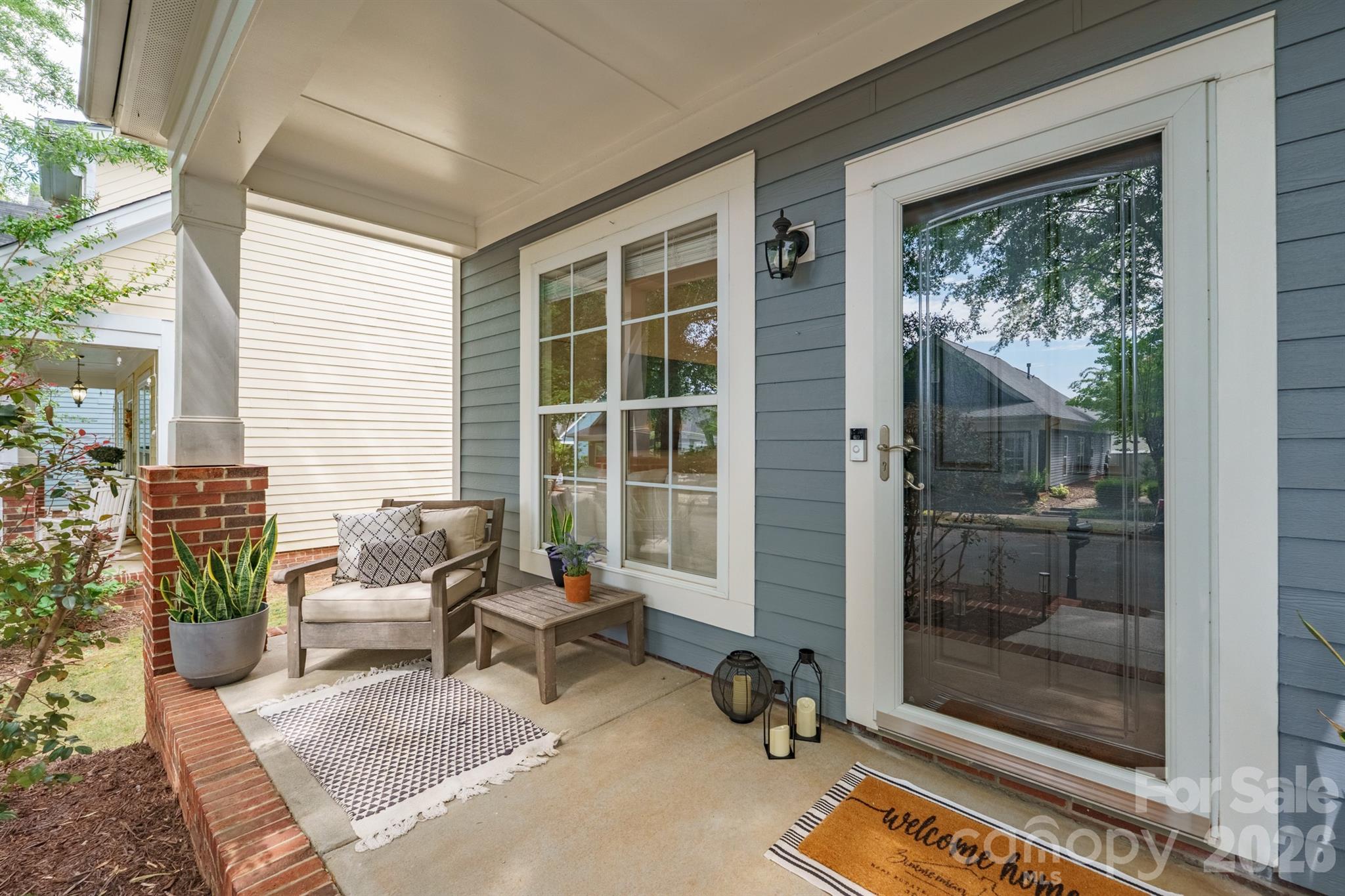 Enjoy morning coffee on your covered front porch! - 14525 Holly Springs Drive, Huntersville