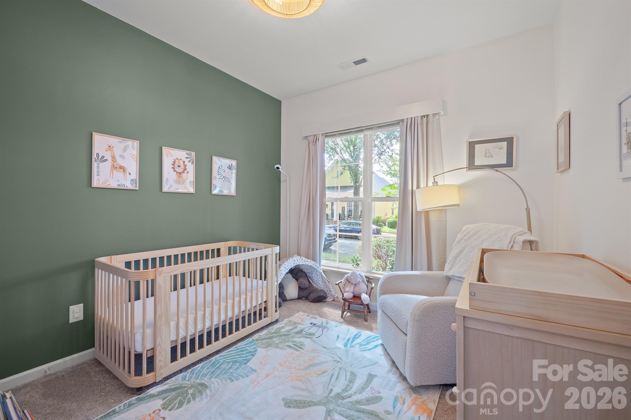 Bed 2 on main, currently an adorable nursery - 14525 Holly Springs Drive, Huntersville