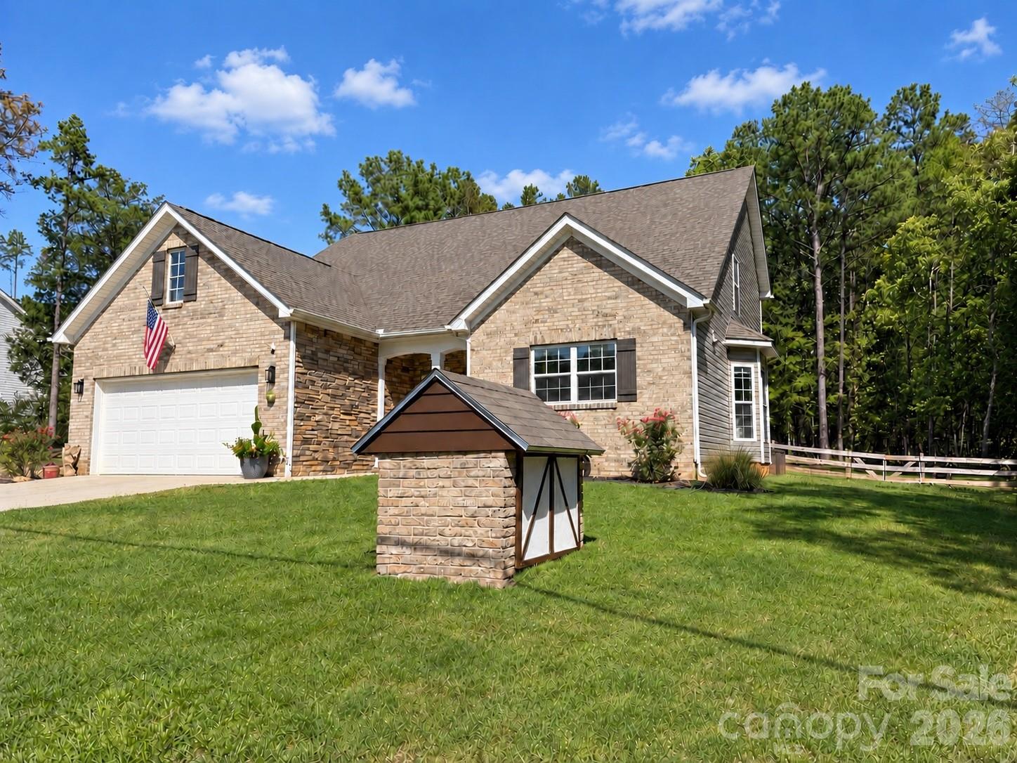 Brick Well house made to match house - 9201 Providence Road S, Waxhaw