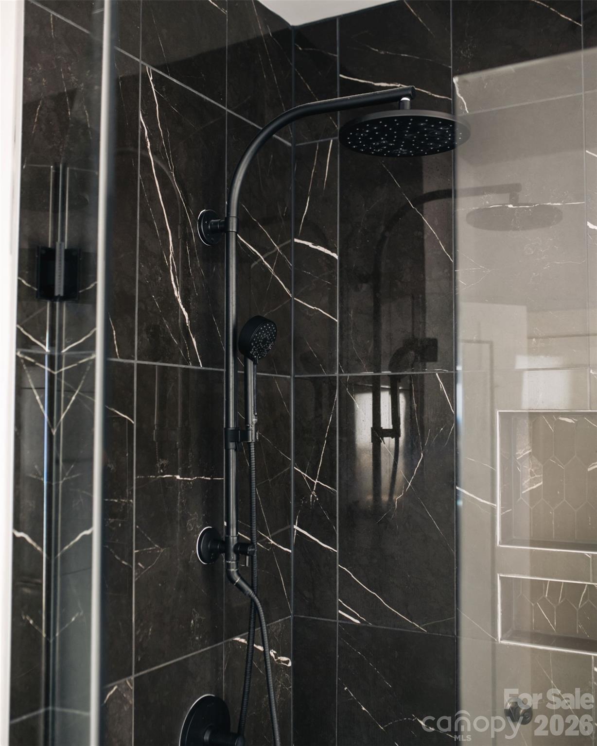 Primary shower with black tile and rain shower head - 4320 Tournette Drive, Indian Land