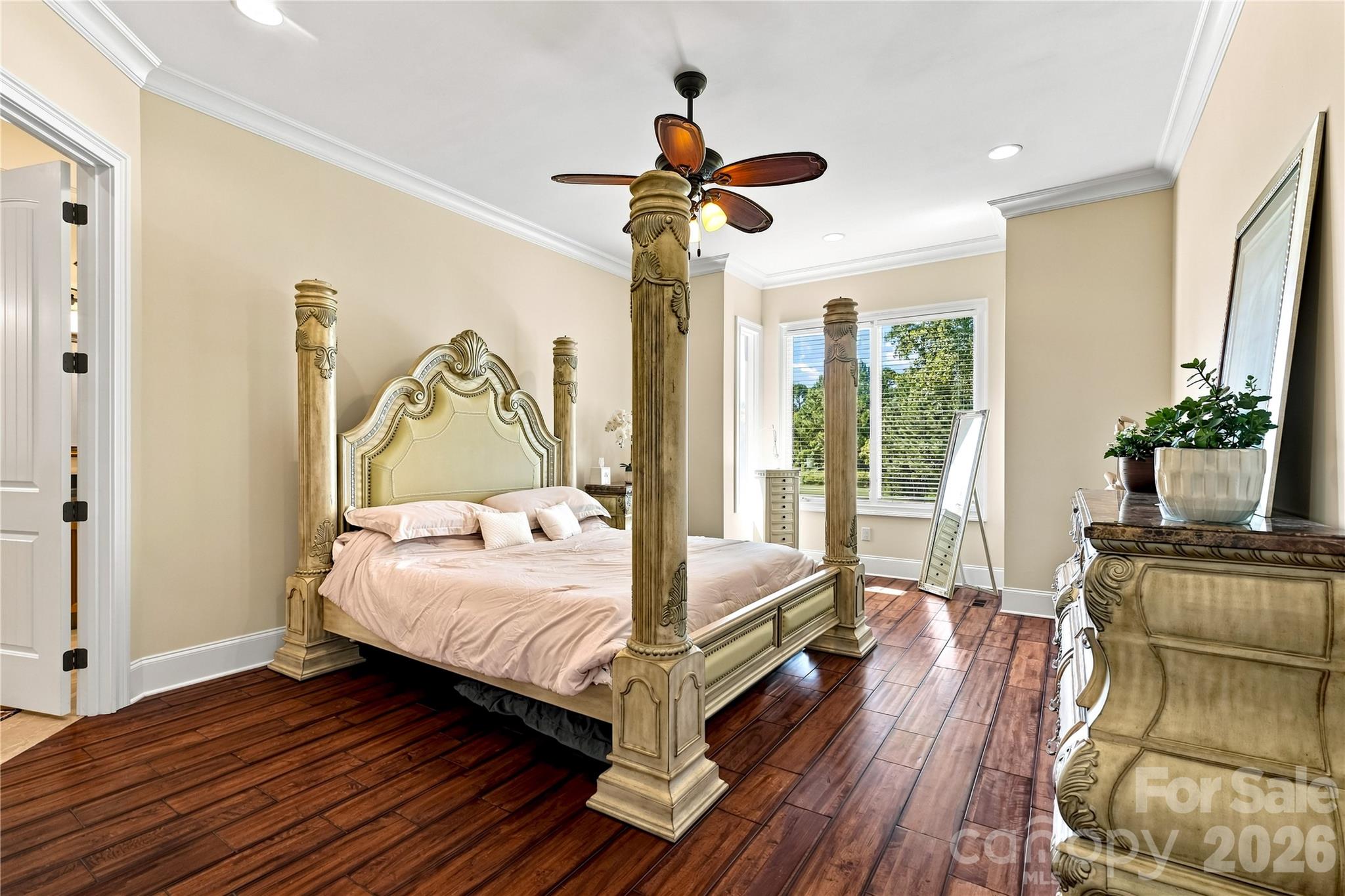 Large primary bedroom with lots of natural light and maple floors - 108 Washam Road, Mooresville