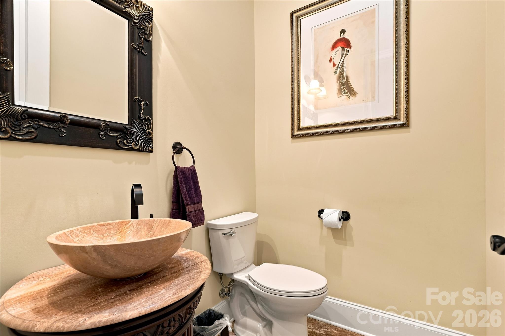 Half bath located off hallway convenient for guests - 108 Washam Road, Mooresville