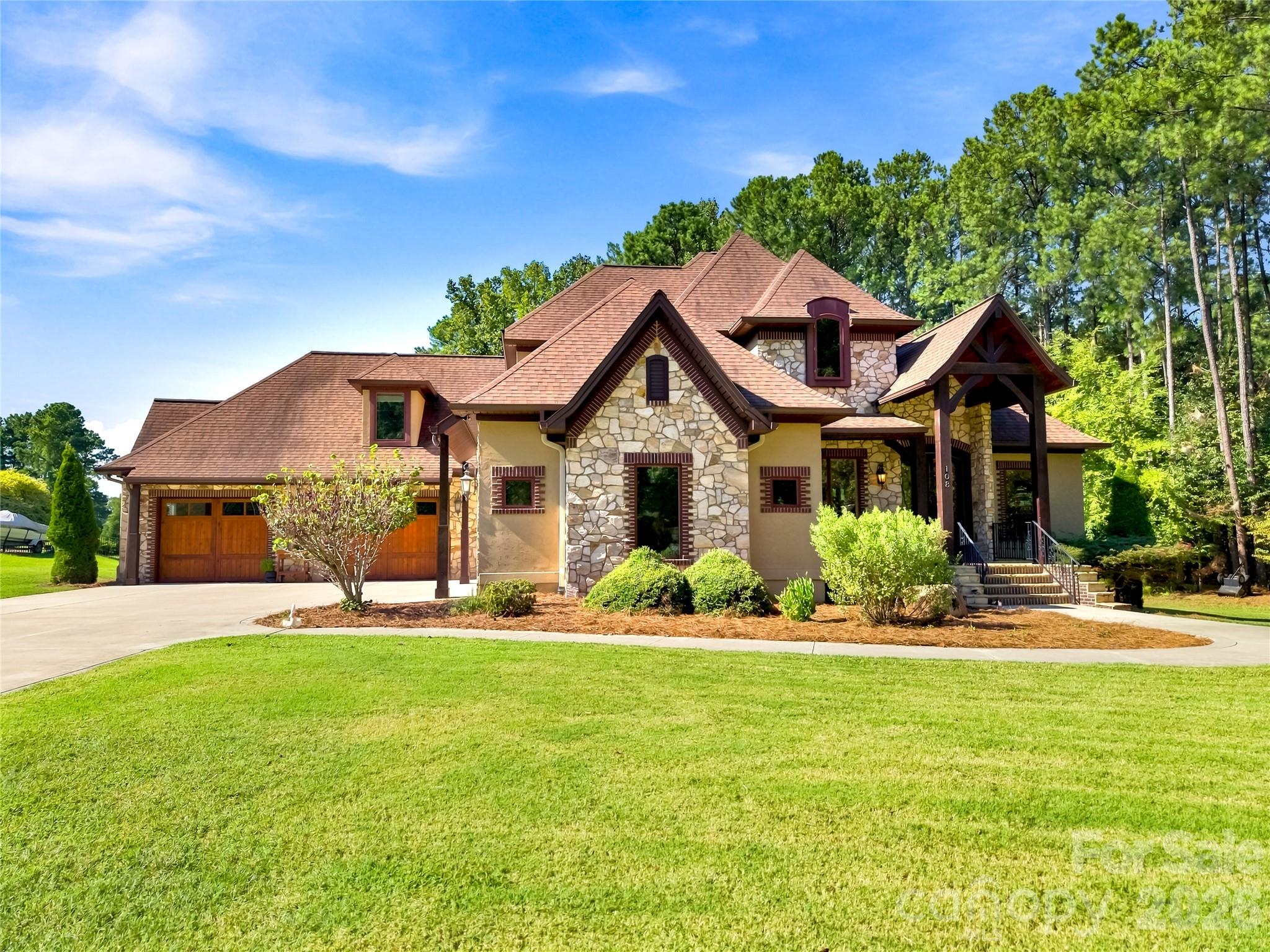 Fascia is aluminum & maintenance fee. Vinyl soffits are maintenance free too. - 108 Washam Road, Mooresville