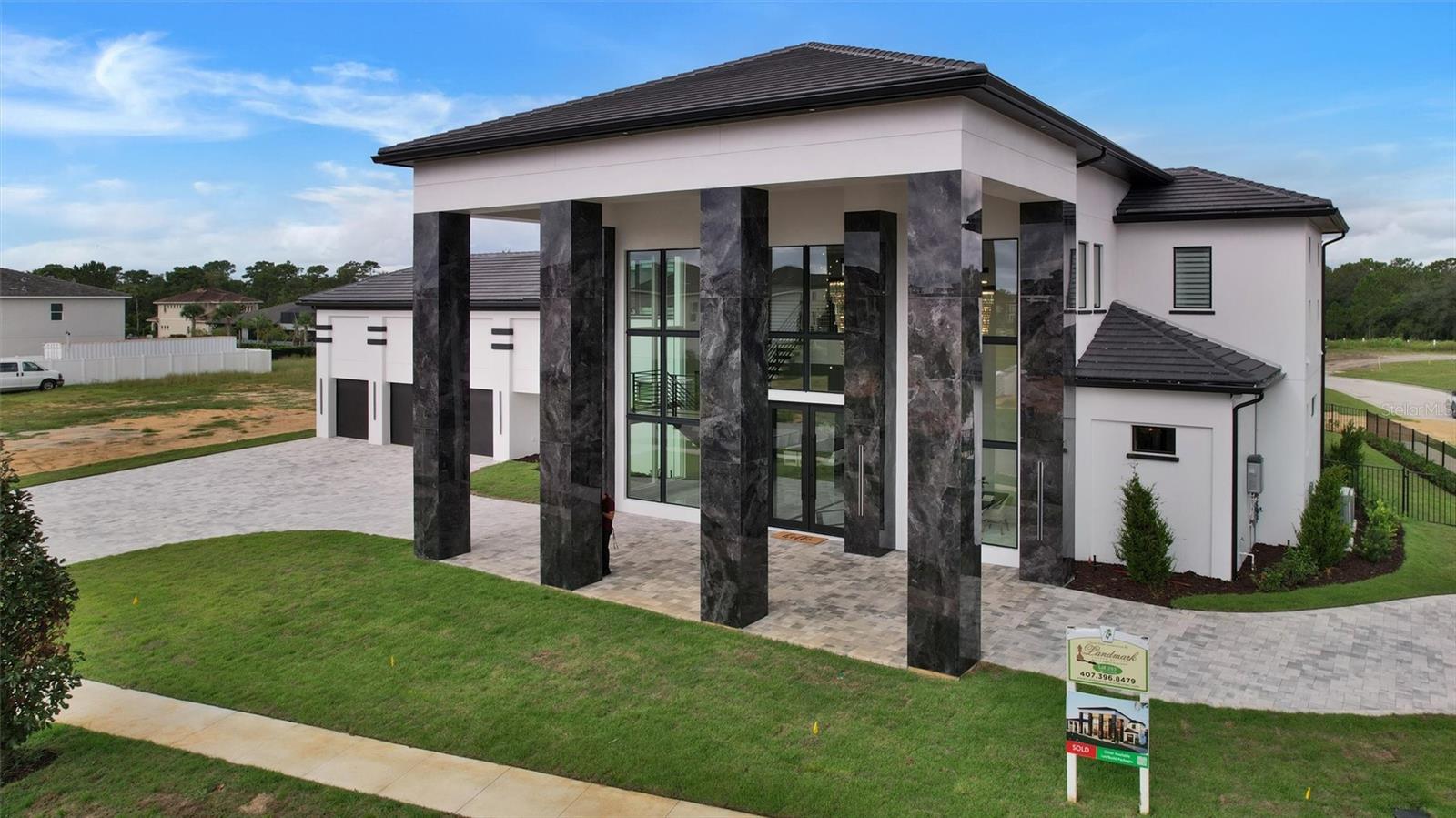 Striking contemporary architecture framed by soaring columns and two-story glass - 1002 COYOTE CREEK WAY, REUNION