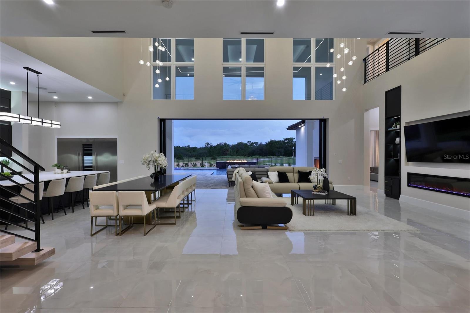 Open-concept Great Room designed for grand-scale living and entertaining - 1002 COYOTE CREEK WAY, REUNION