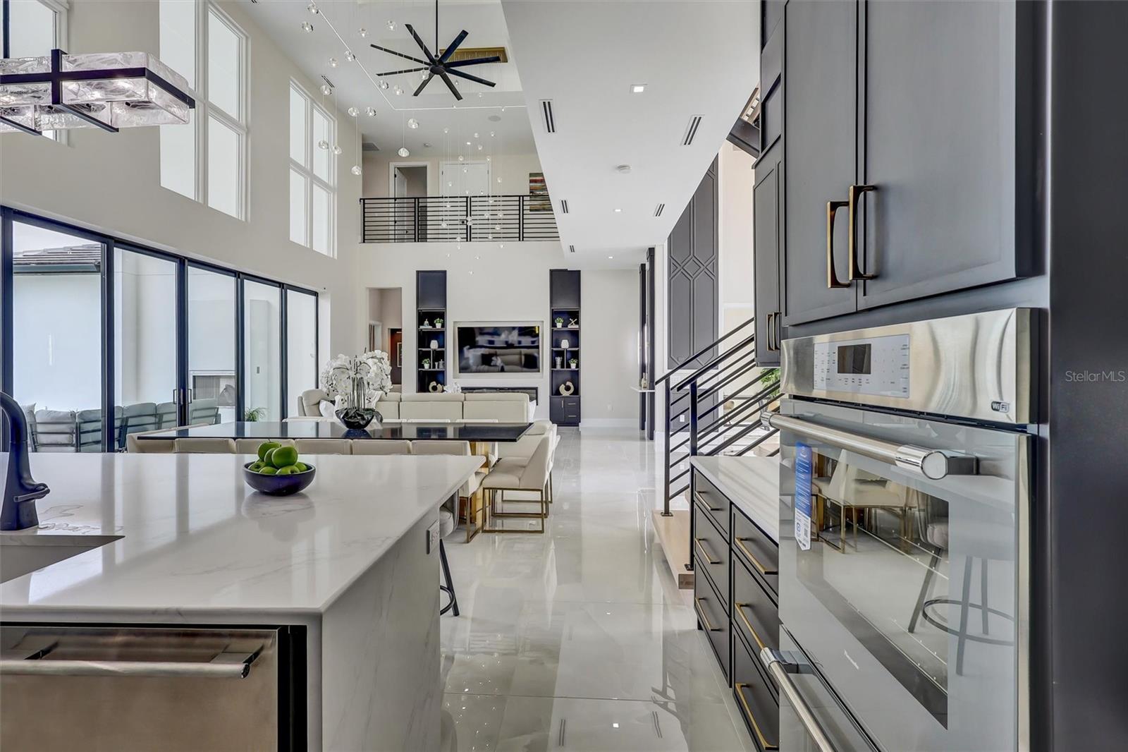 Expansive kitchen designed to remain connected to the Great Room - 1002 COYOTE CREEK WAY, REUNION