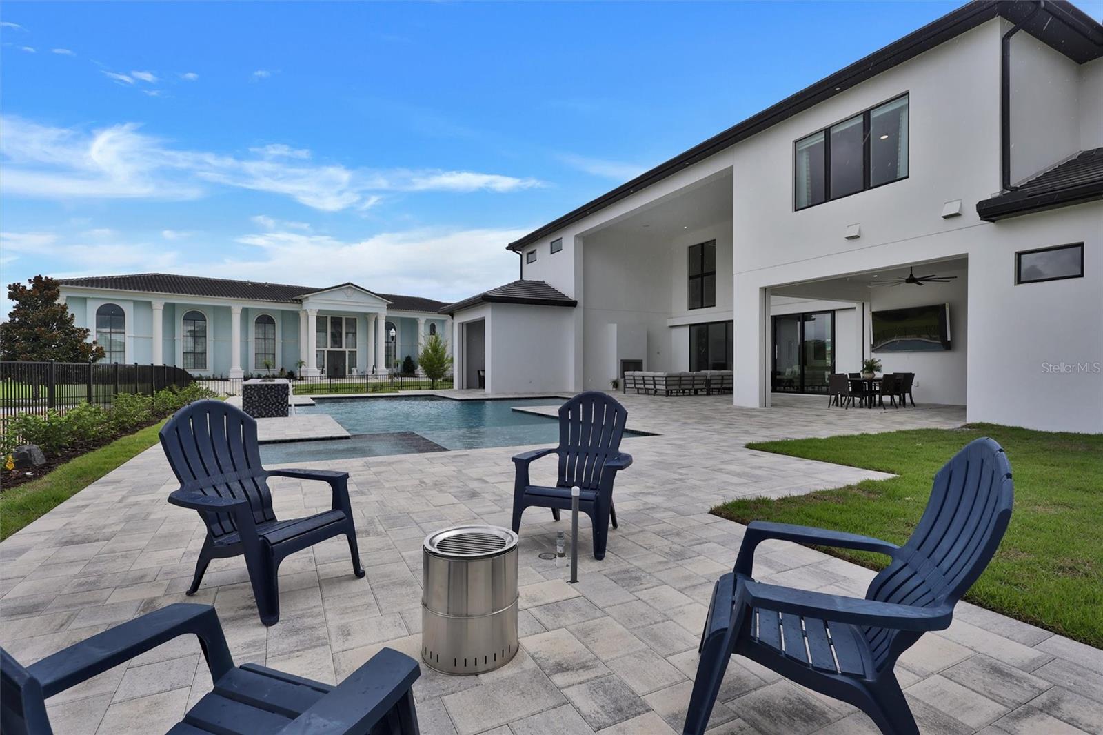 Huge pool deck with a firepit for intimate shared moments - 1002 COYOTE CREEK WAY, REUNION