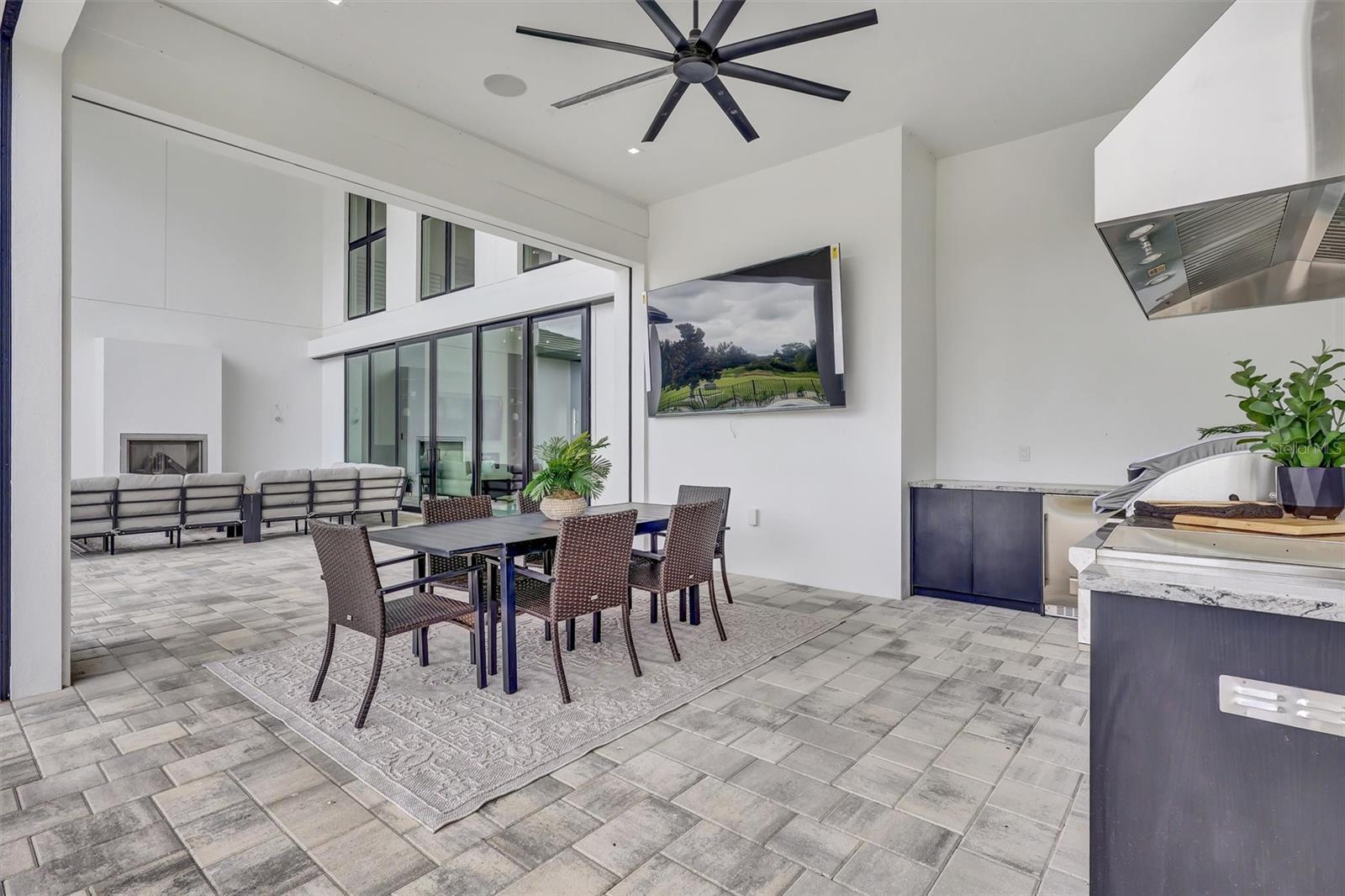 Full summer kitchen and covered dining area for effortless outdoor entertaining - 1002 COYOTE CREEK WAY, REUNION