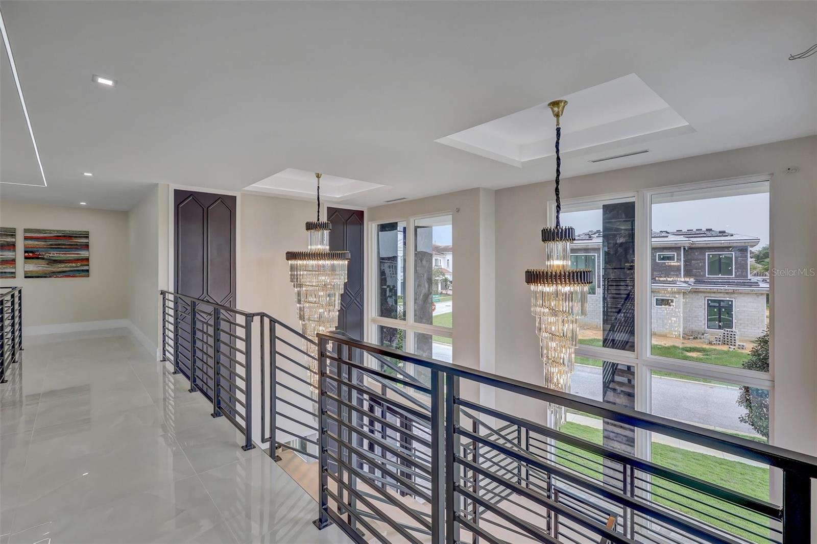 Upper gallery overlooks the dramatic two-story Great Room - 1002 COYOTE CREEK WAY, REUNION