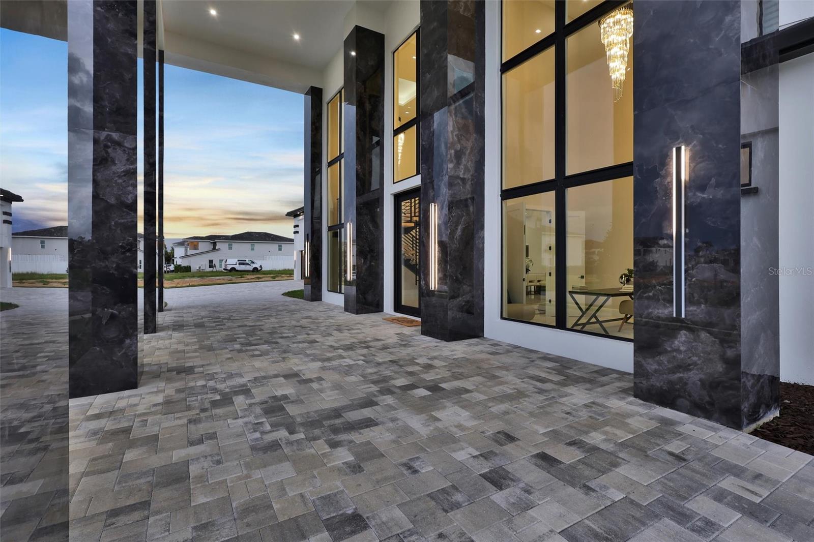 Covered Porte-cochere for sophisticated, sheletered staement arrival - 1002 COYOTE CREEK WAY, REUNION