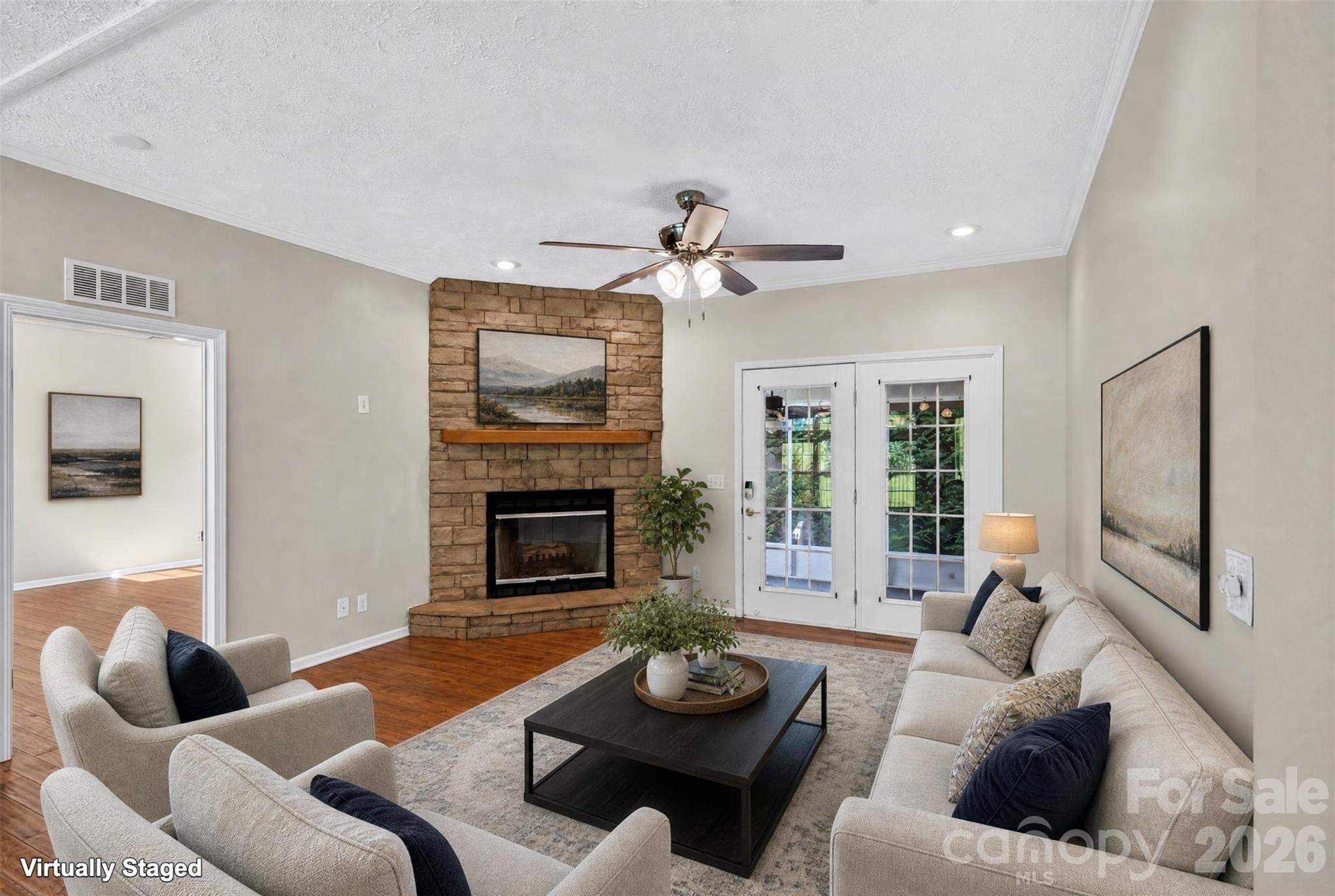 cozy living room with gas fireplace (virtually staged) - 6 Enochs Way, Fletcher