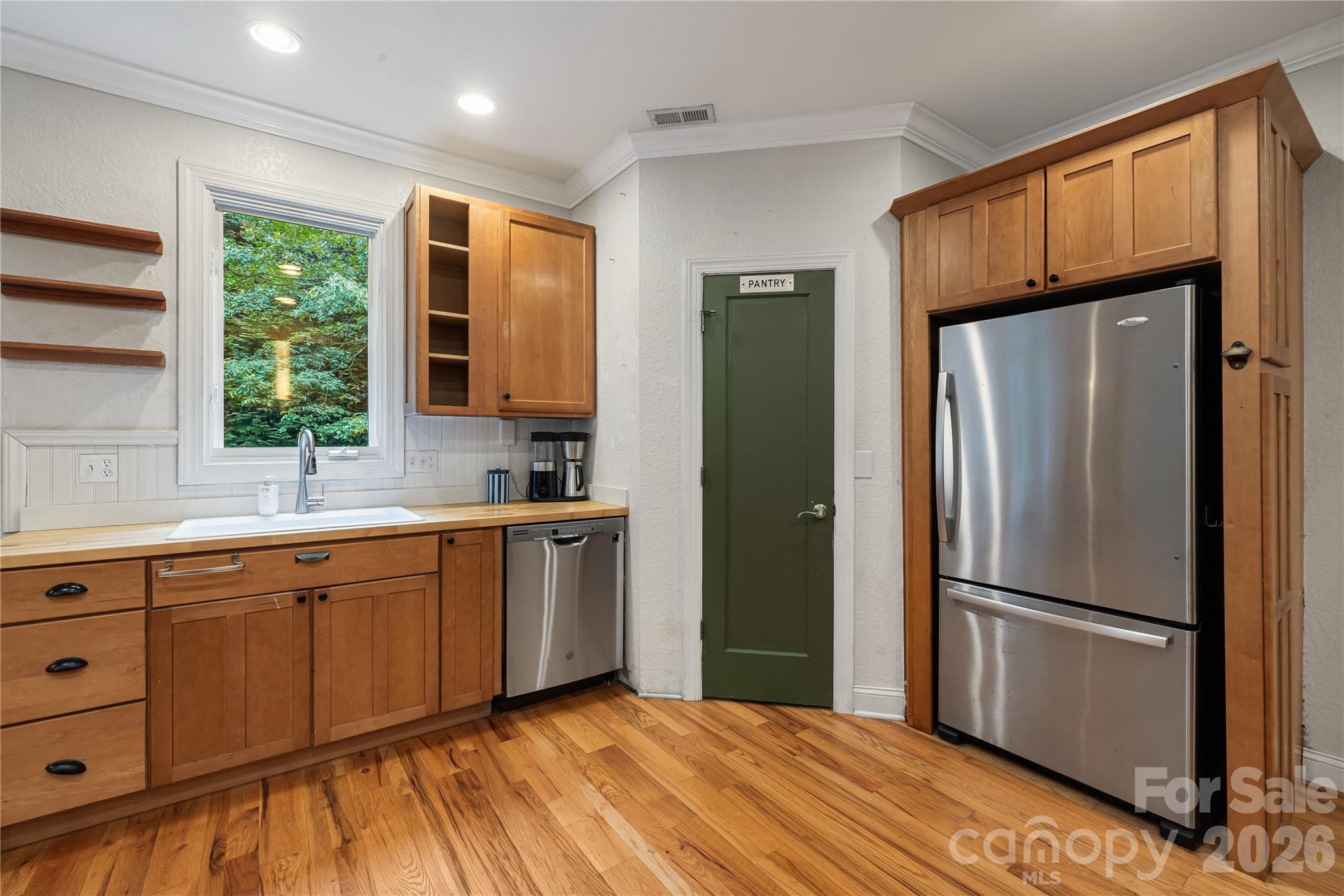 Single Family Residence at 312 E Forest Place, Candler, photo 11 of 44
