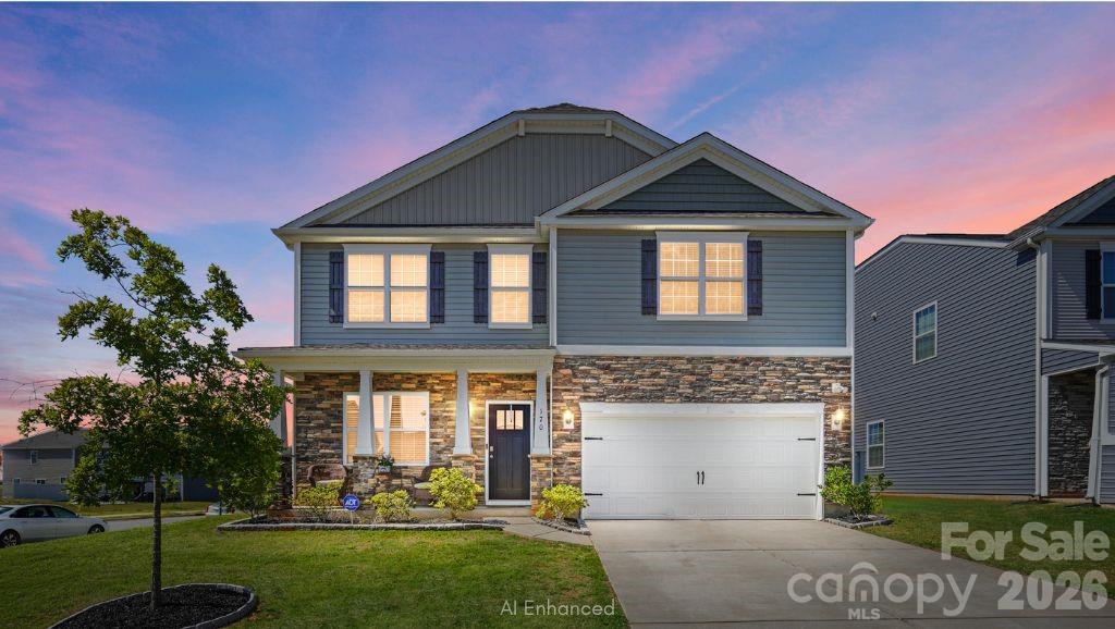 Welcome home to timeless curb appeal on a desirable end lot with beautiful stone accents. - 170 Giant Oak Avenue, Statesville