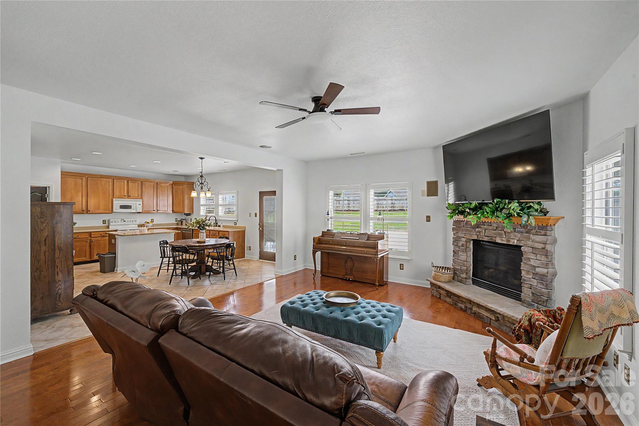 Great room flows into large kitchen - 329 Farm Springs Drive, Mount Holly