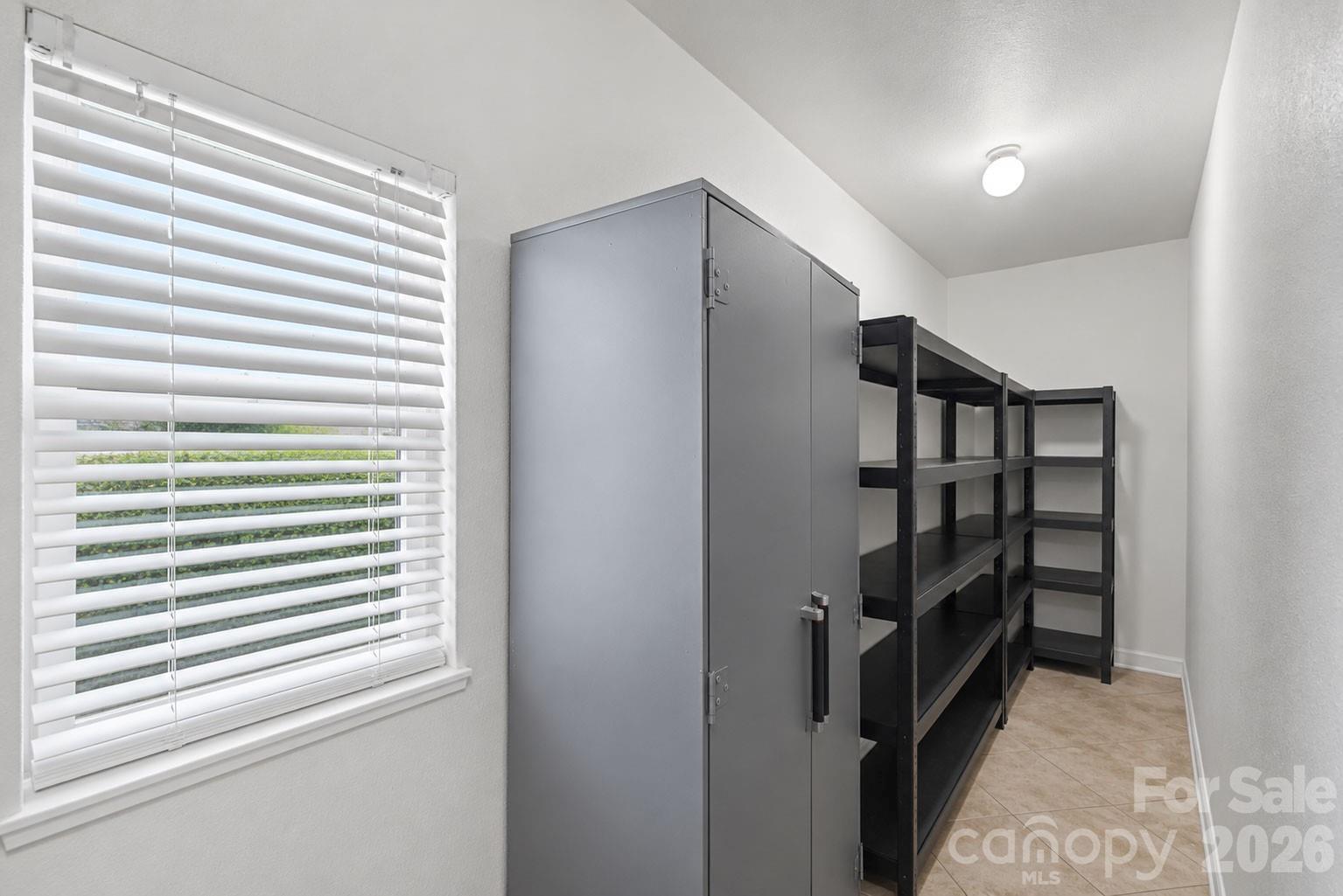 Huge walk-in pantry. Photo enhanced for visual clarity and spatial context. - 329 Farm Springs Drive, Mount Holly