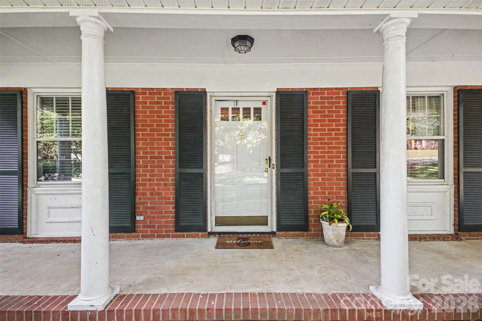 You will enjoy this large covered rocking chair front porch - 113 Brookshire Avenue, Kannapolis