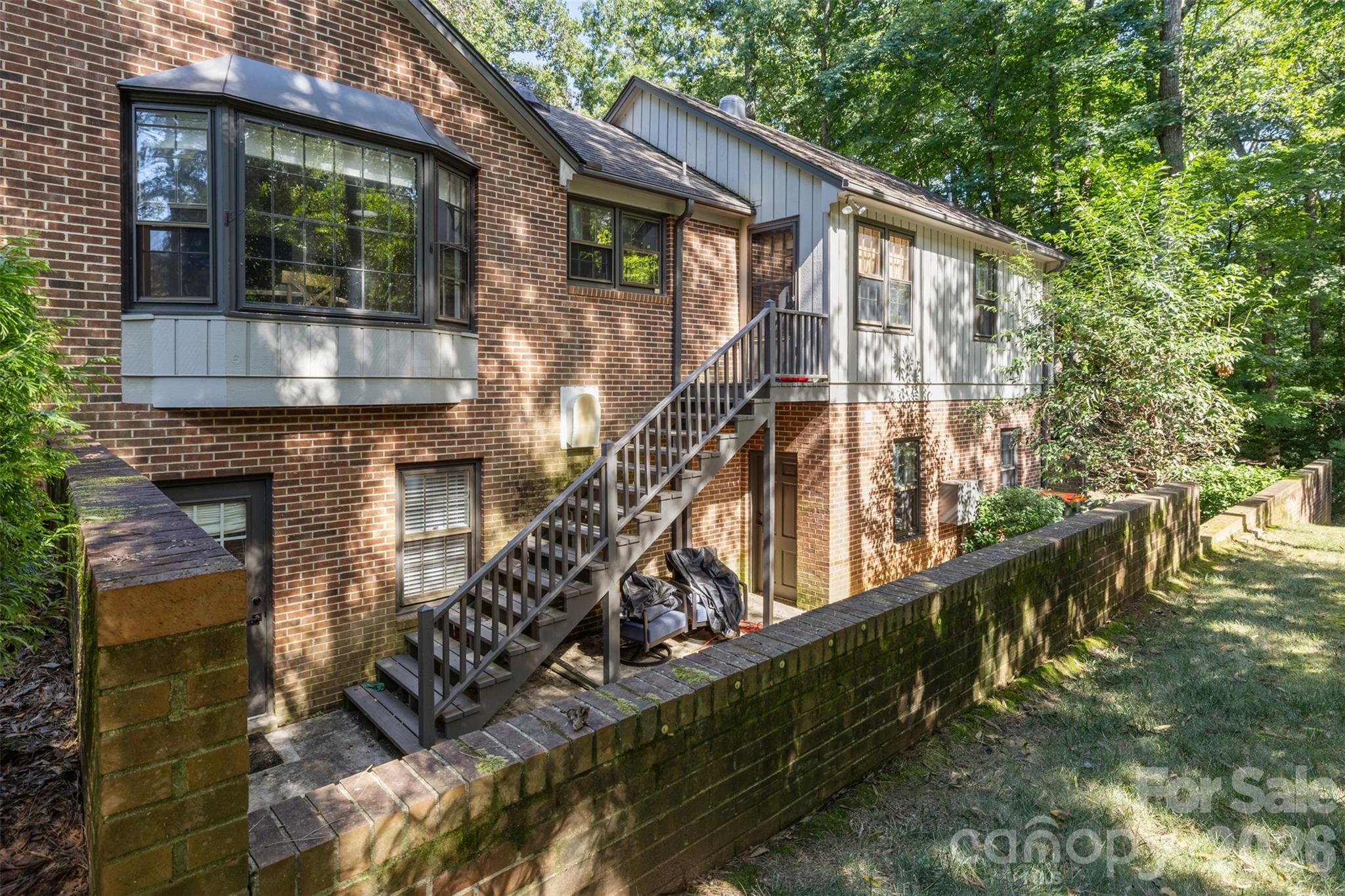 Stairs from kitchen to private courtyard. - 10 Bald Eagle Road, Lake Wylie
