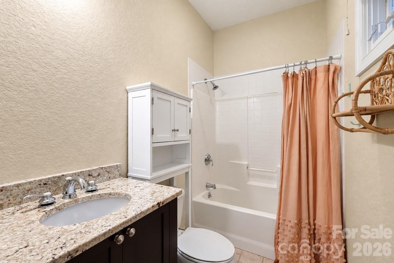 Downstairs en suite bathroom. - 312 E Forest Place, Candler