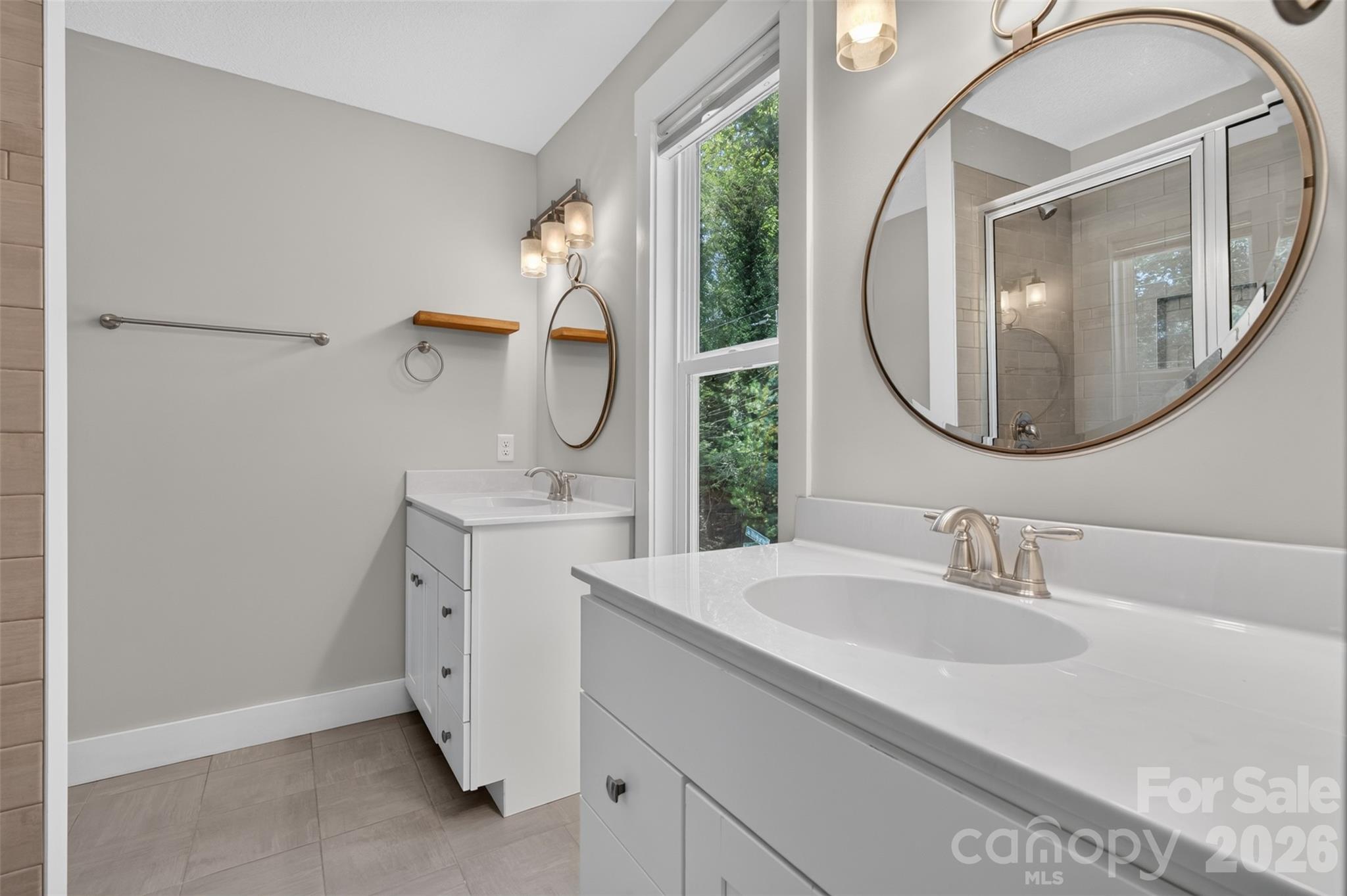 Primary bathroom with two vanities - 134 Shelburne Road, Asheville