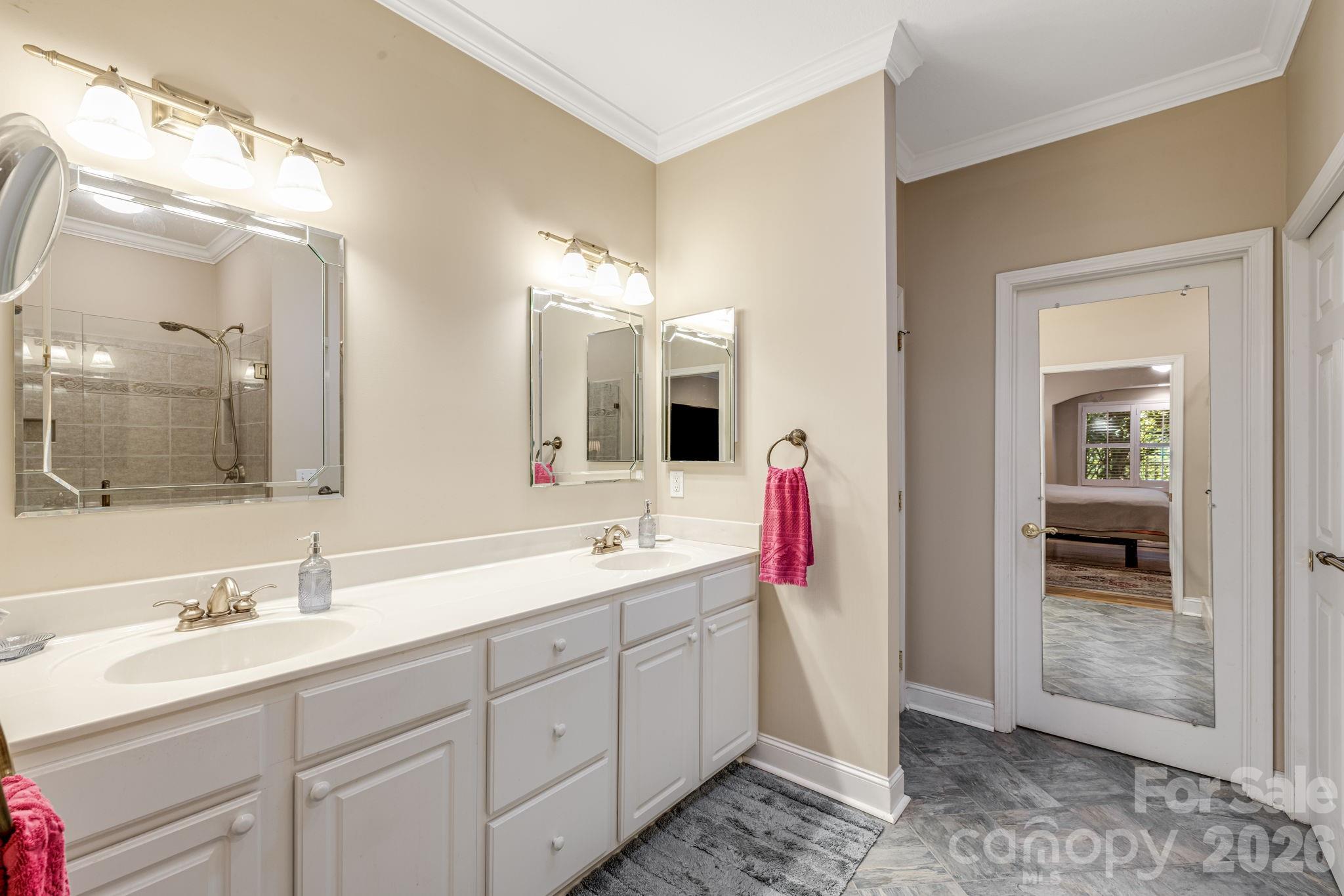 Dual vanity sinks with a water closet. - 212 Carriage Springs Way, Hendersonville