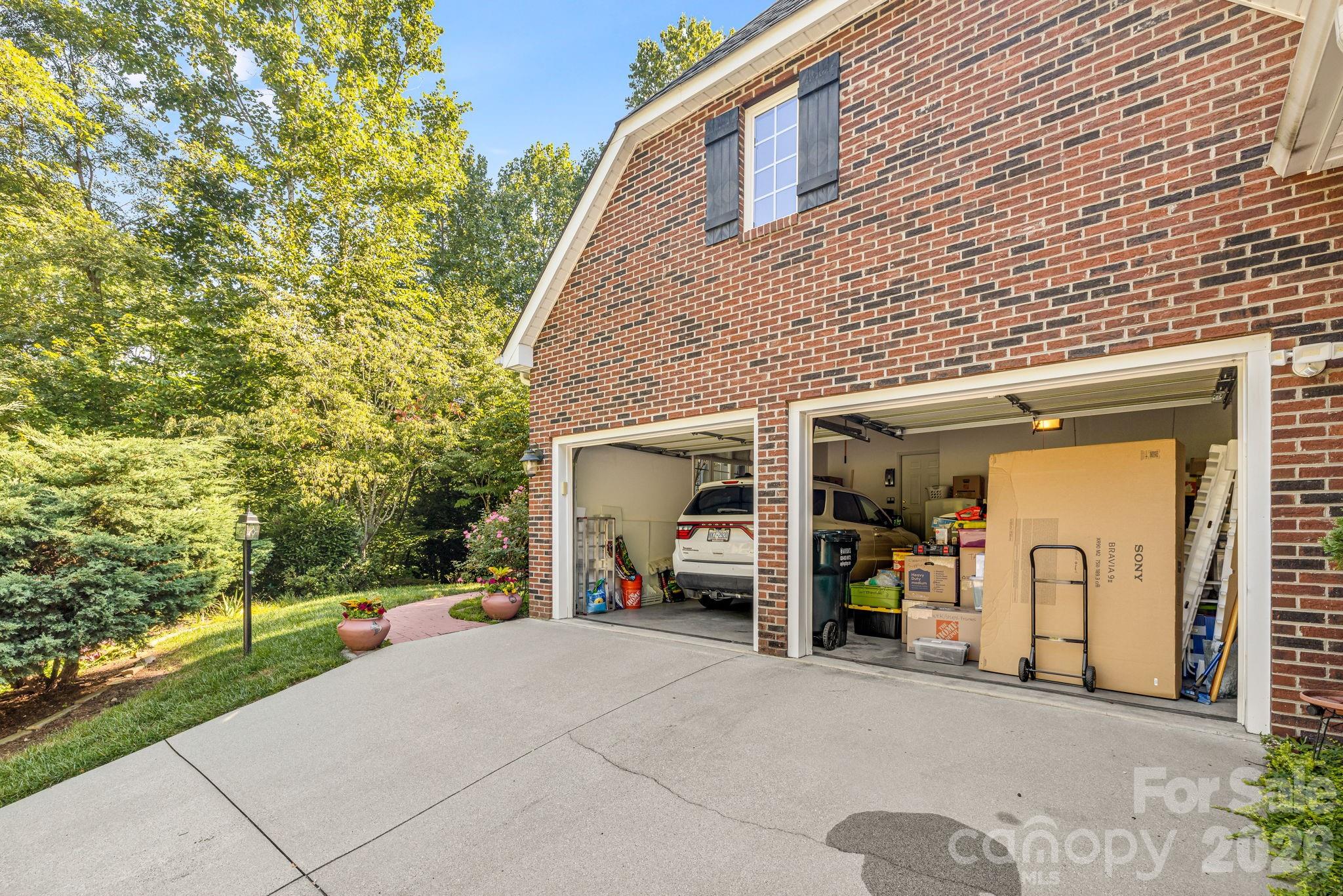 Look how much this garage holds. Ready to move! - 212 Carriage Springs Way, Hendersonville