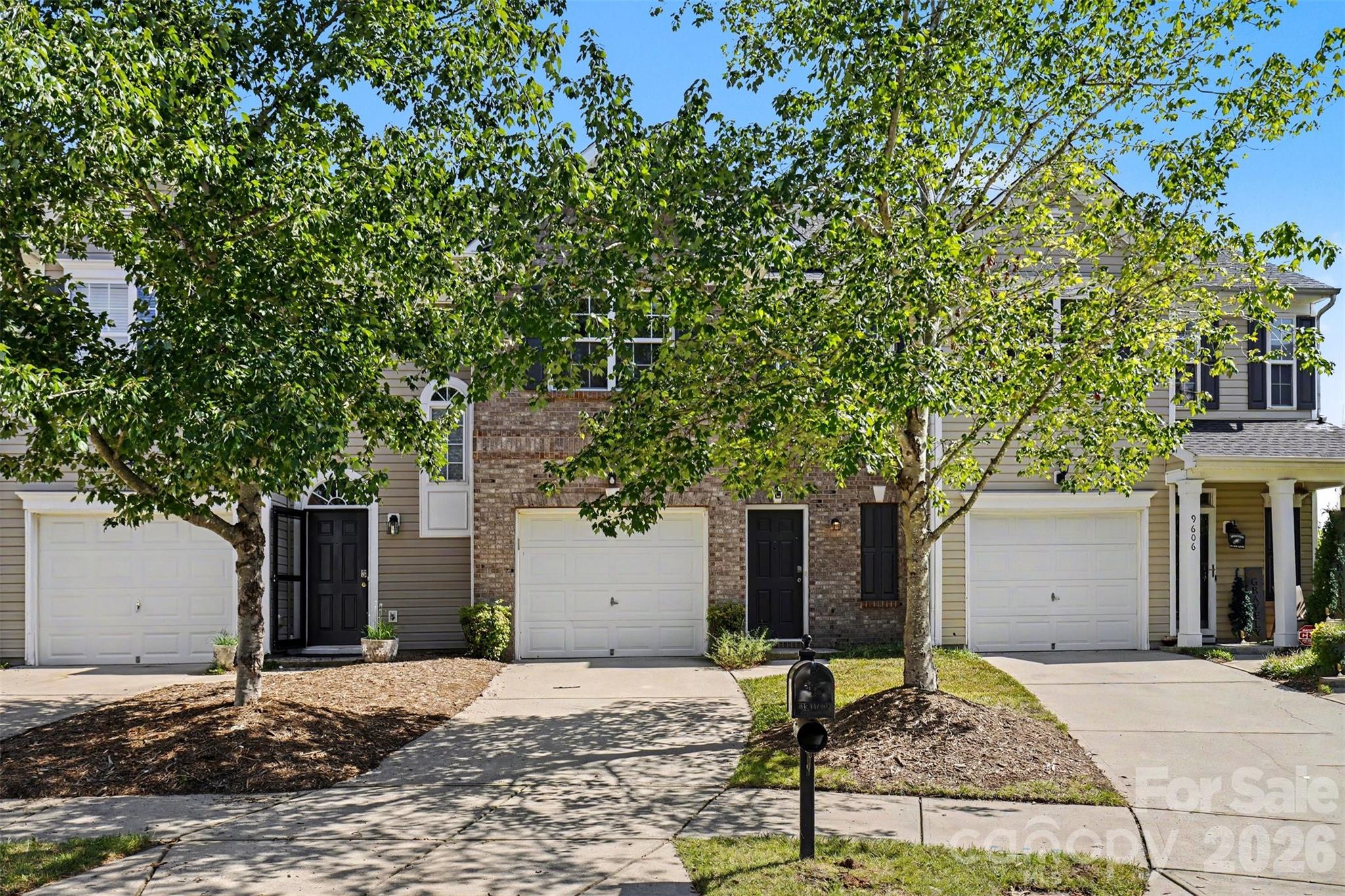 Townhouse at 9610 Walkers Glen Drive NW, Concord, photo 2 of 40