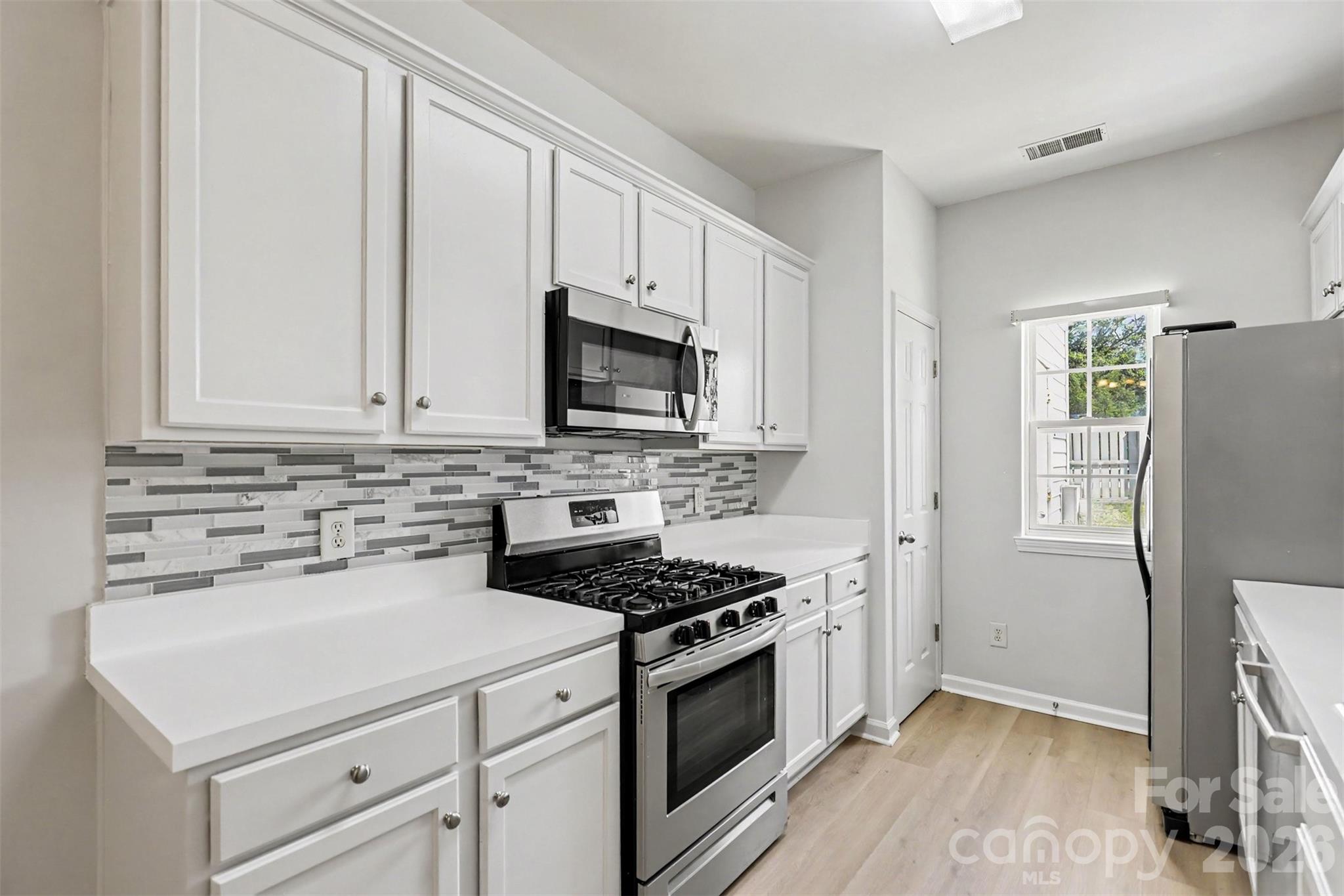 Townhouse at 9610 Walkers Glen Drive NW, Concord, photo 13 of 40