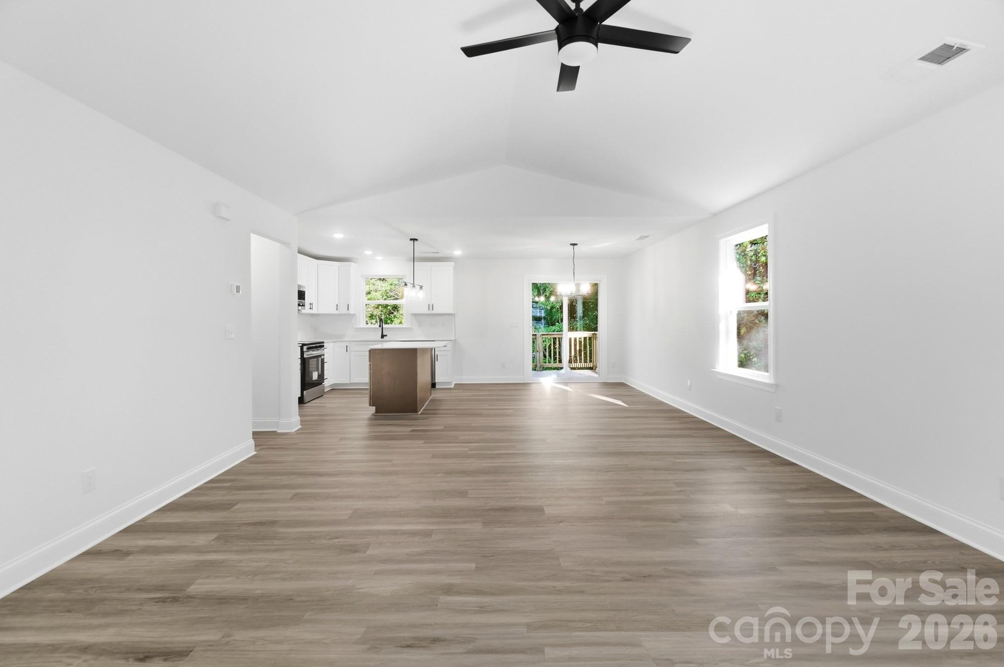 View of Living Room, Dining Room and Kitchen with breakfast bar - 1074 Mountain Crest Drive, Kings Mountain