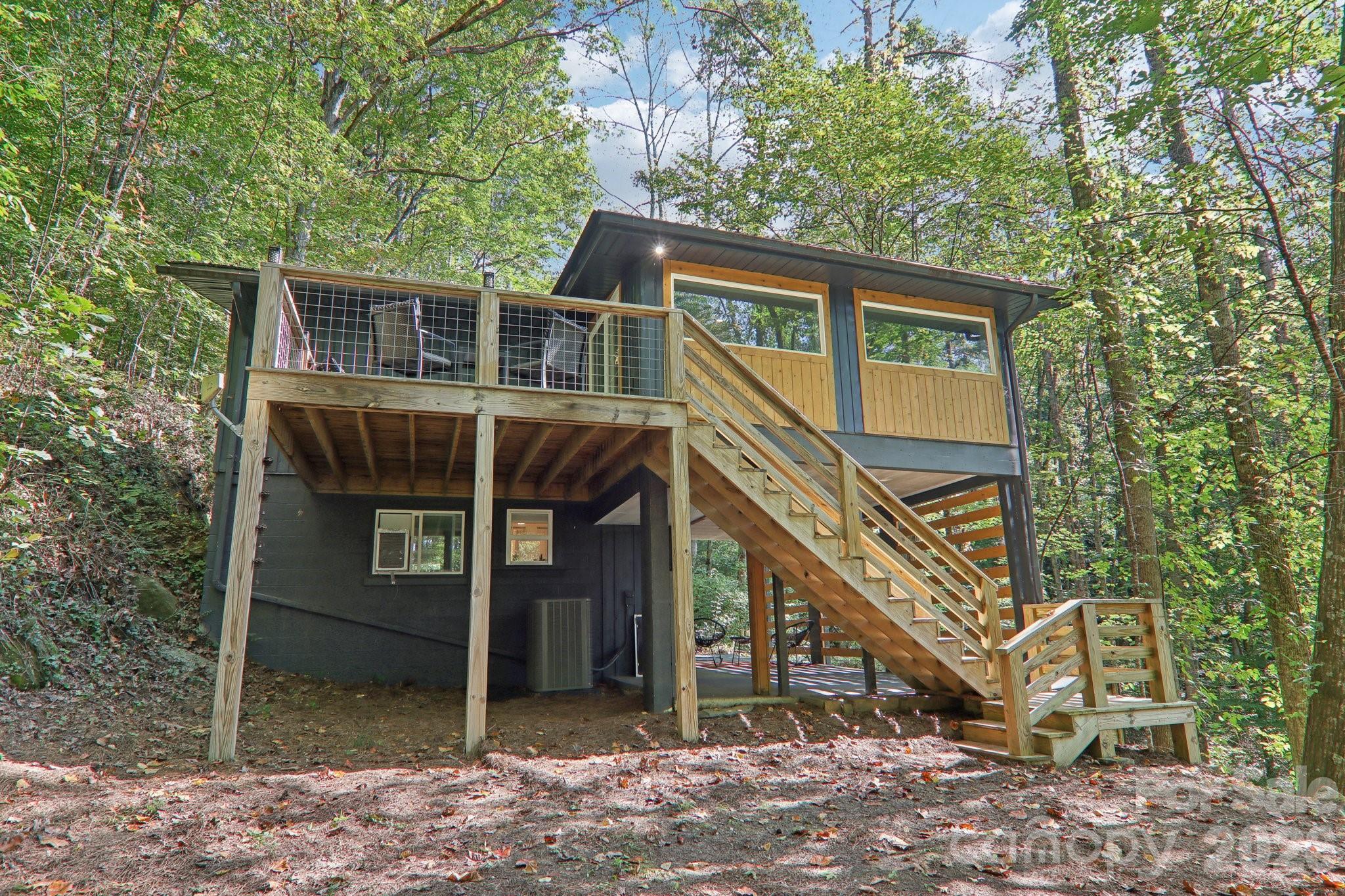 Back deck and steps to firepit or carport - 315 Bear Cove Road, Bryson City