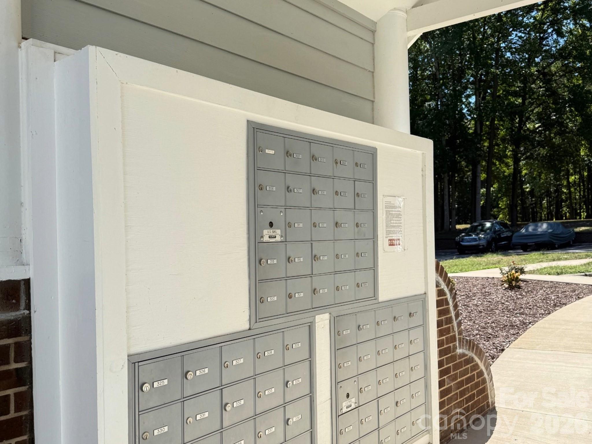 mailbox tree right beside your building - 327 Northwest Drive, Davidson
